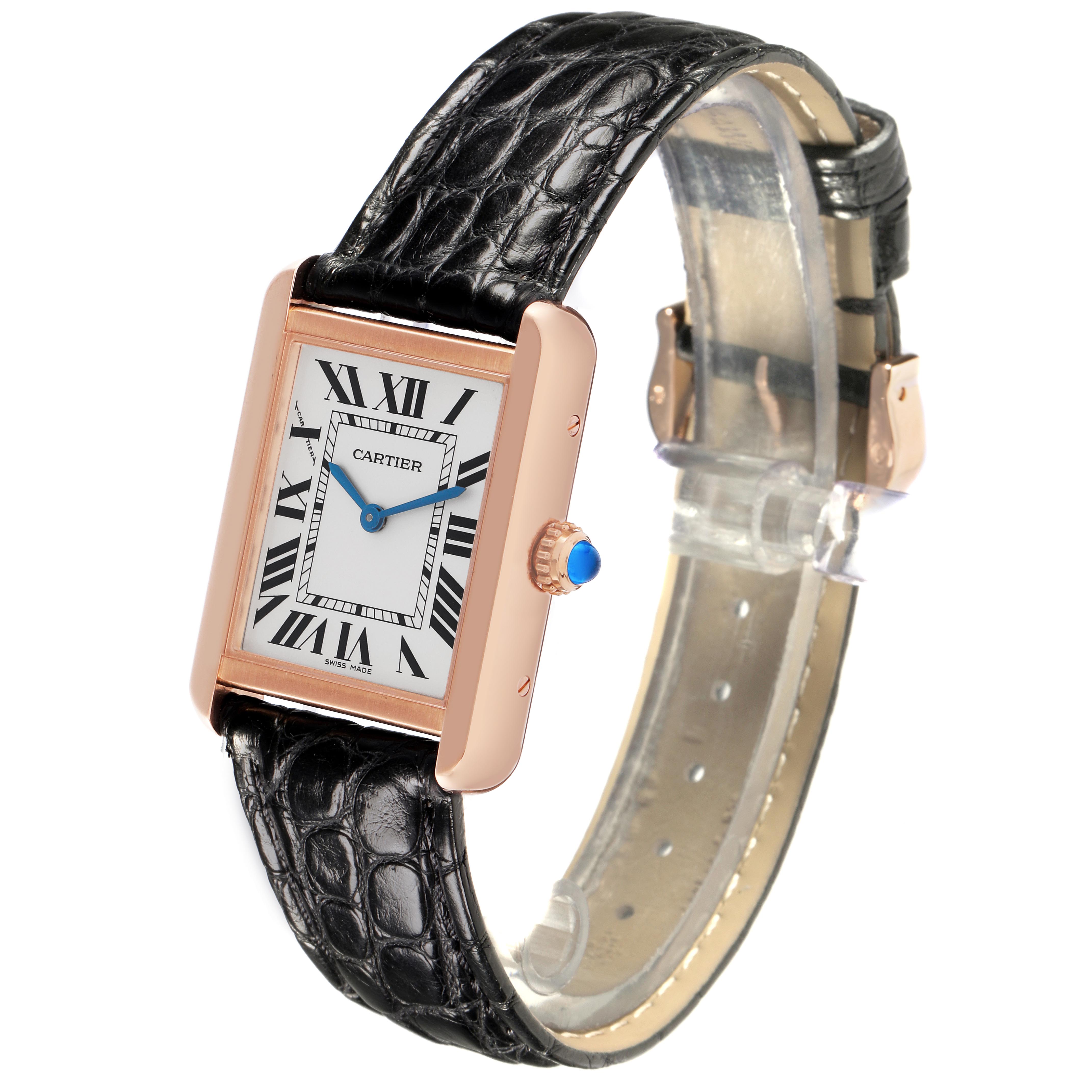 The Cartier Tank Solo W5200024 Women's Rose Gold Silver Dial W5200024 Women's Rose Gold Silver Dial is shown at an angled side view, displaying the face, Roman numerals, crown, and black leather strap.
