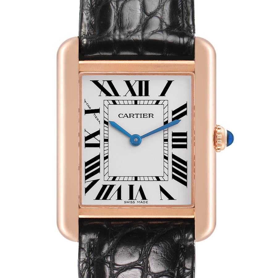 The Cartier Tank Solo watch is shown from a front angle, highlighting the dial, Roman numerals, blue hands, and leather strap.