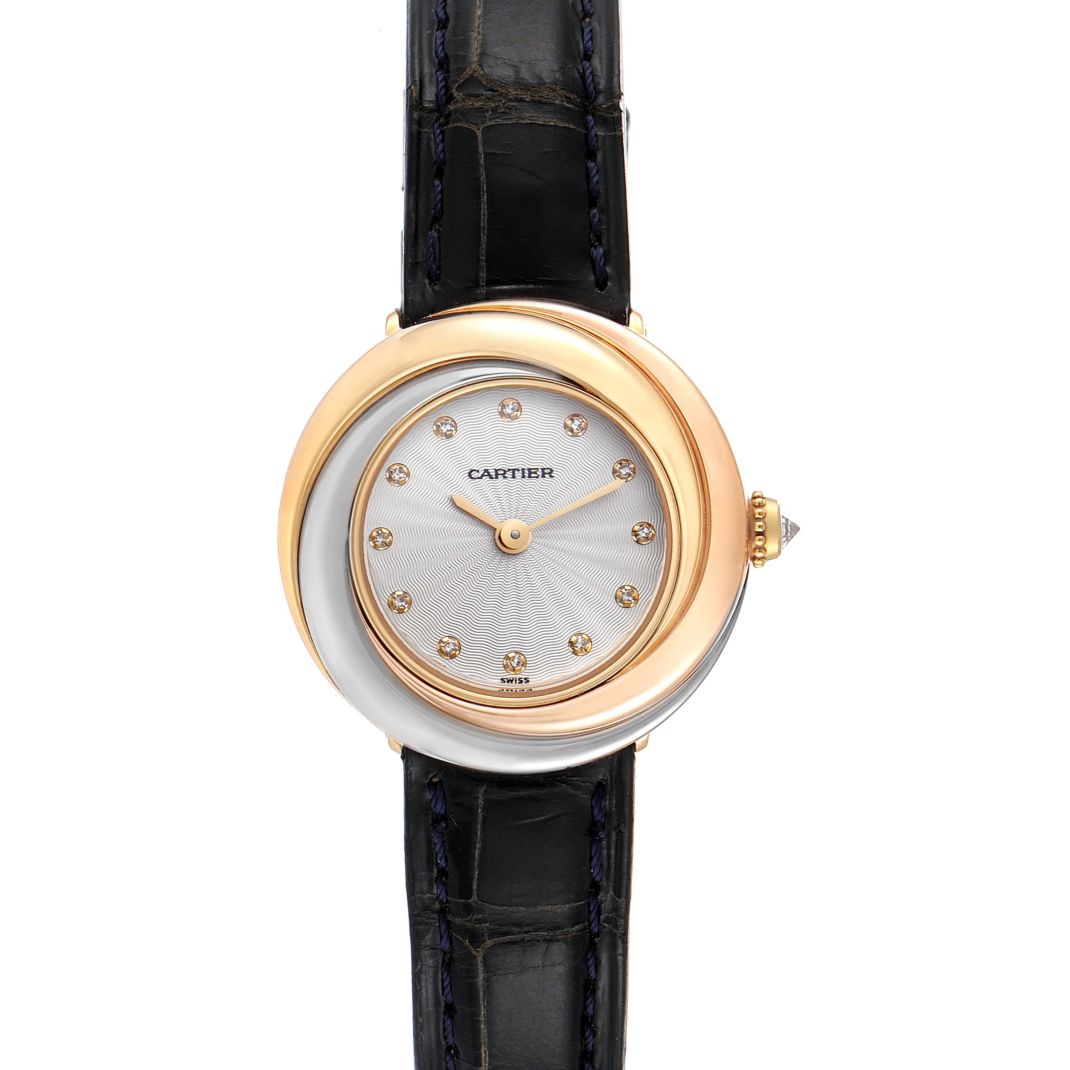 The Cartier Trinity W200246 Women's Yellow Gold Beige Dial W200246 Women's Yellow Gold Beige Dial watch is shown from a top-down angle, displaying its face, hands, bezel, and strap.