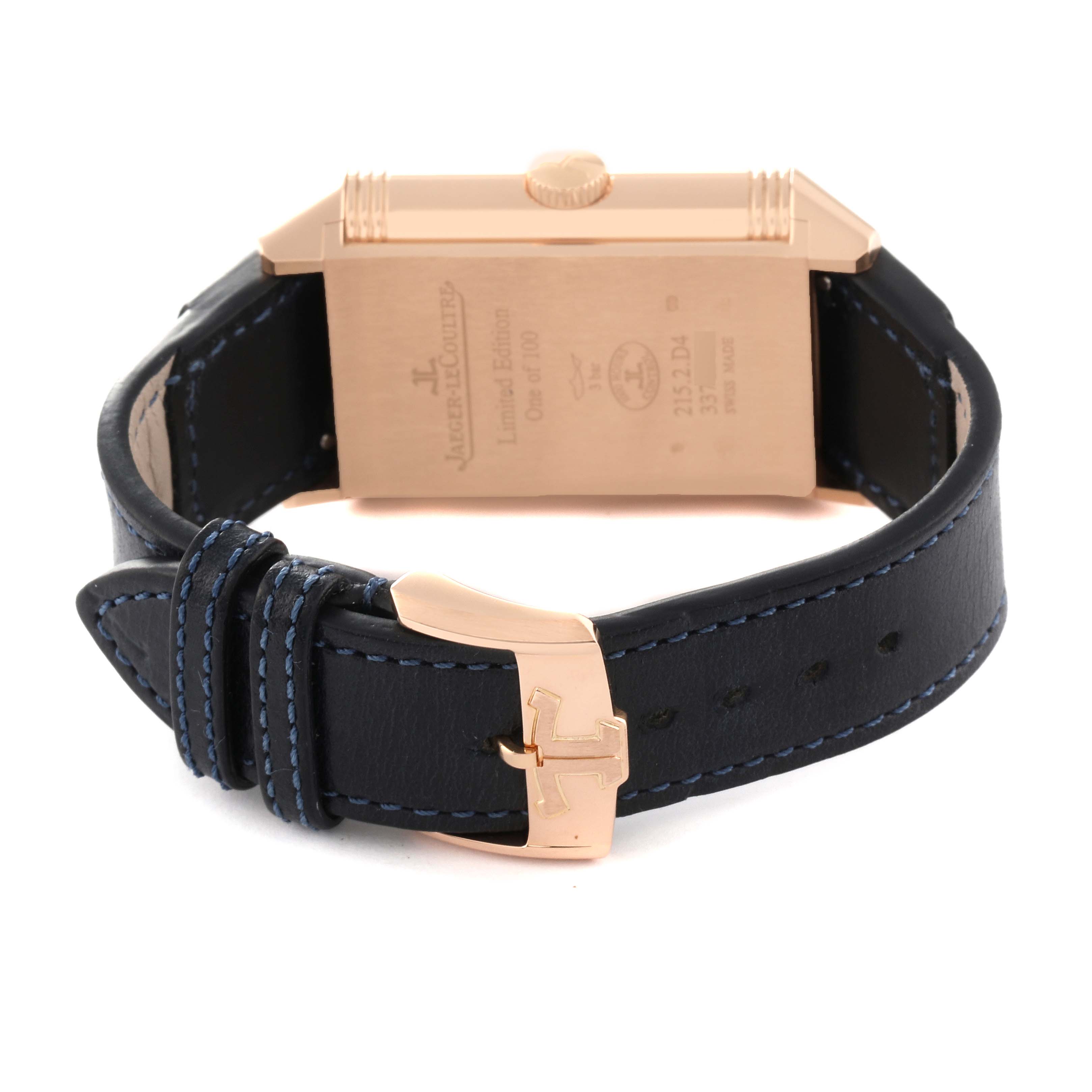 The image shows the back of a Jaeger LeCoultre Reverso Q398258J Men's Rose Gold Silver Dial Q398258J Men's Rose Gold Silver Dial watch, including its case back, leather strap, and clasp.