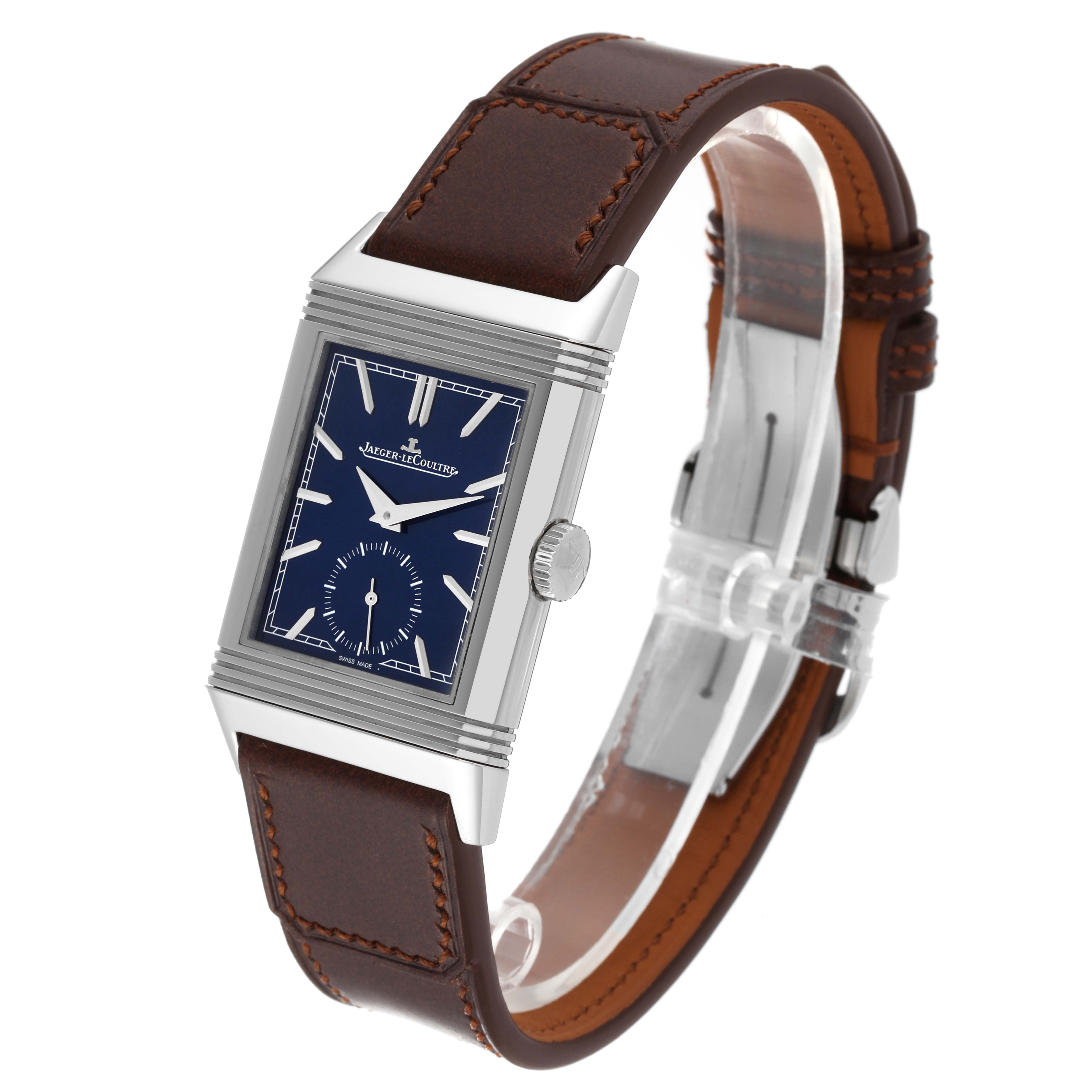 This image shows the Jaeger-LeCoultre Reverso watch at an angled view, highlighting its rectangular face, brown leather strap, and side crown.