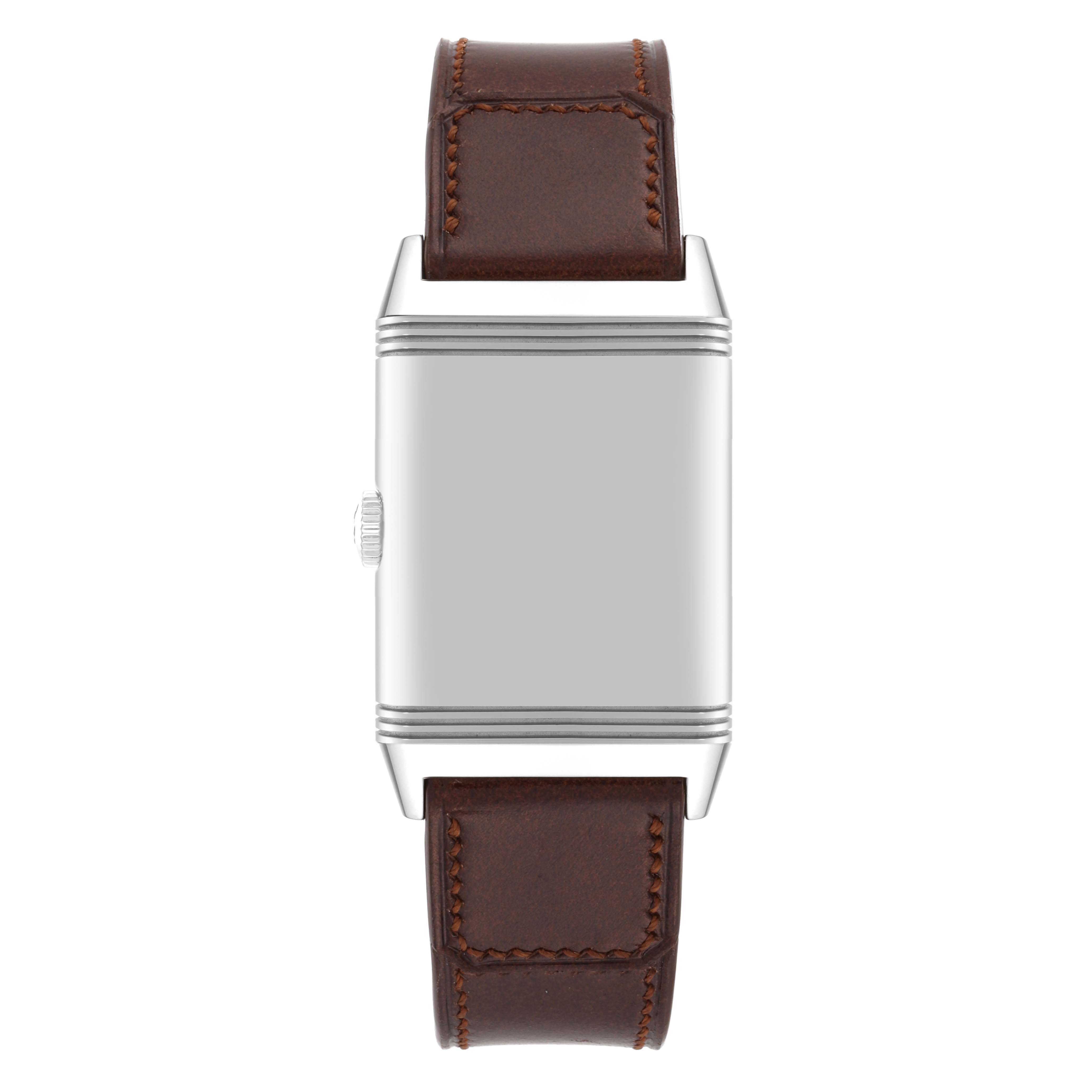 The image shows a Jaeger LeCoultre Reverso Q3978480 Men's Stainless Steel Blue Dial Q3978480 Men's Stainless Steel Blue Dial watch from the front, featuring a rectangular case and a brown leather strap.