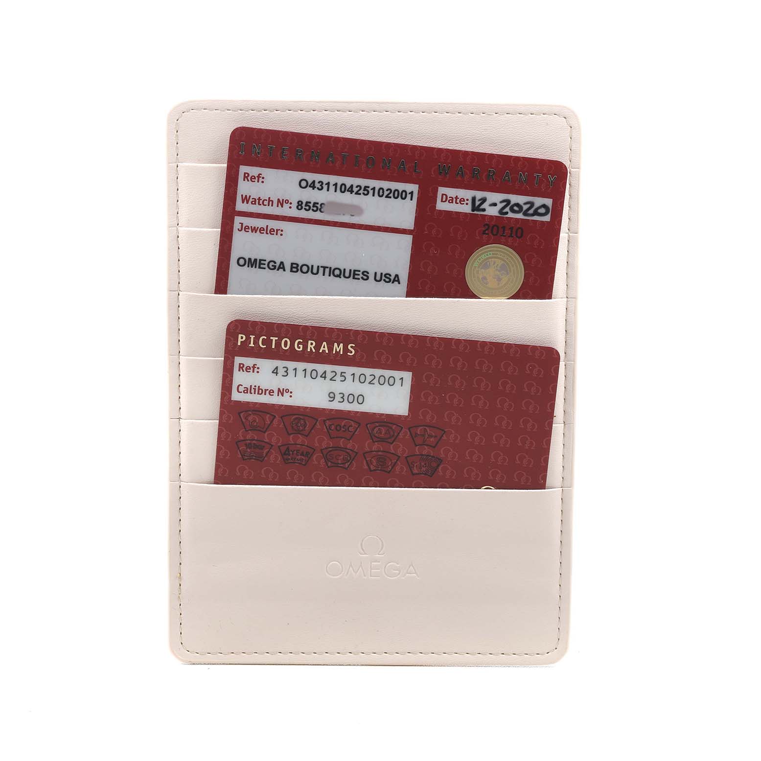 The image shows warranty and pictogram cards for an Omega De Ville 431.10.42.51.02.001 Men's Stainless Steel Silver Dial watch in a branded cardholder.