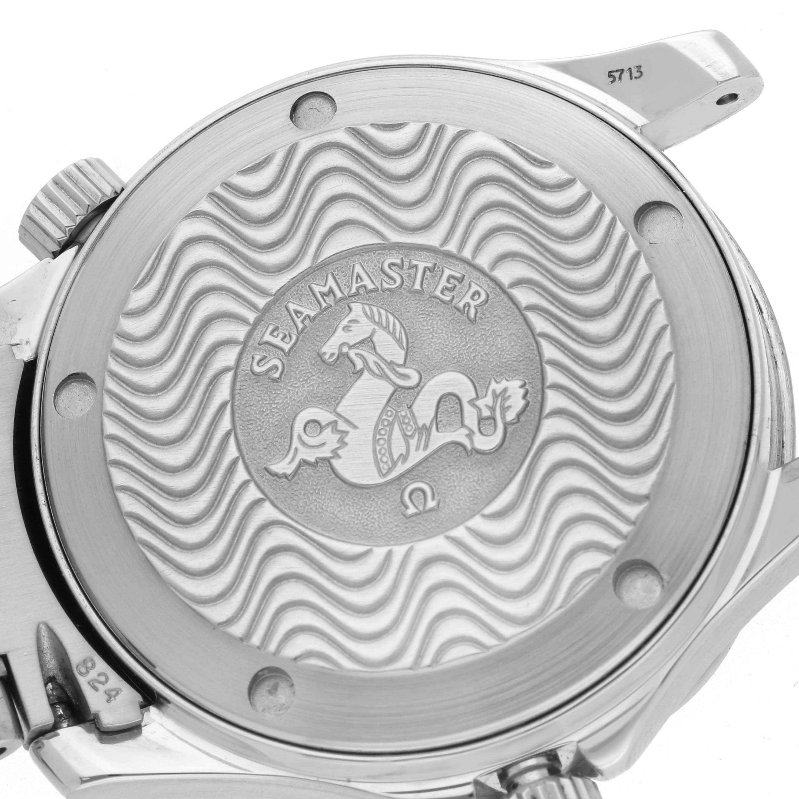 The image shows the case back of an Omega Seamaster 2561.80.00 Men
s Stainless Steel Blue Dial 2561.80.00 Men
s Stainless Steel Blue Dial watch with a wave pattern and the Seamaster logo.