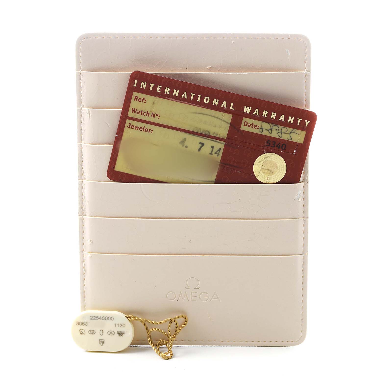 The image shows a warranty card and a tag for an Omega Seamaster 2254.50.00 Men's Stainless Steel Black Dial watch, positioned in a display holder.