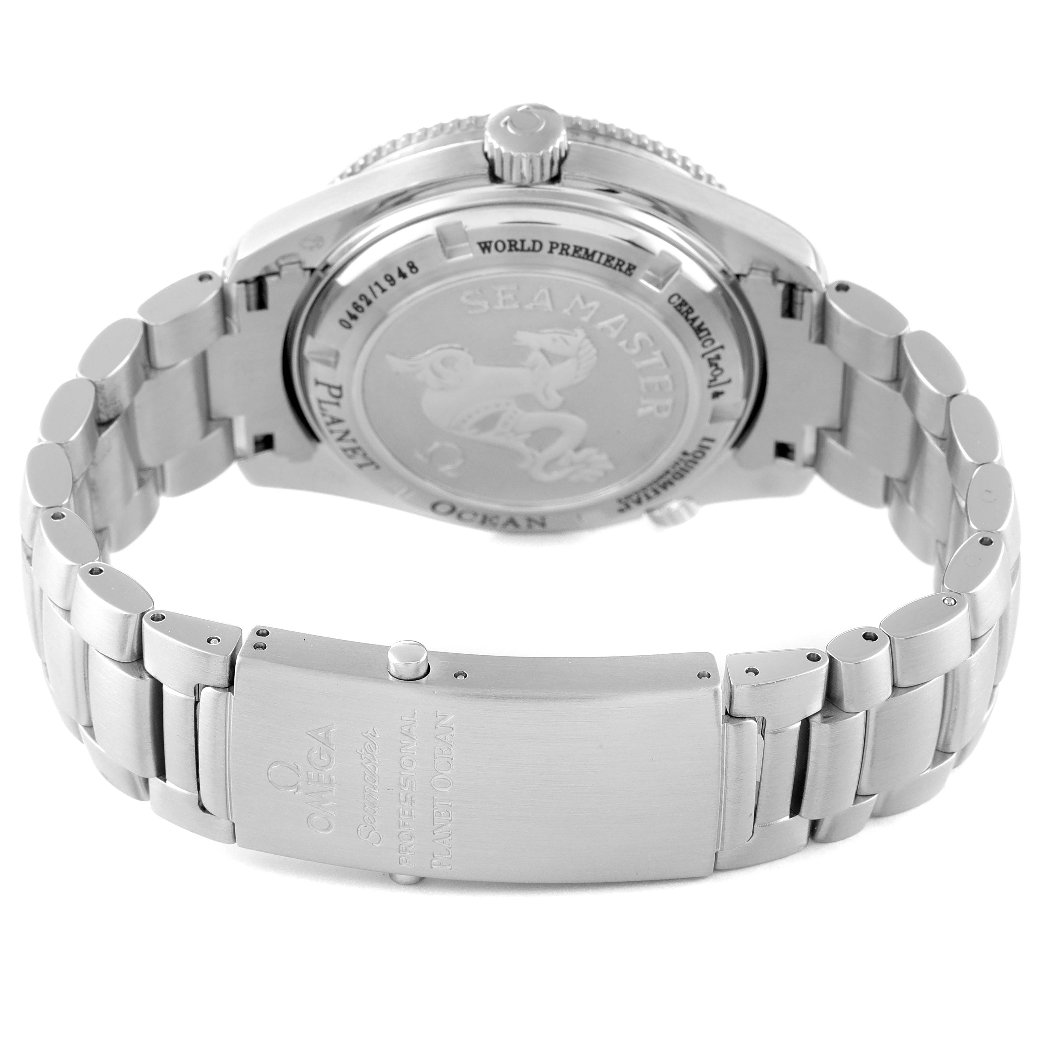 The image shows the back of the Omega Planet Ocean 222.30.42.20.01.001 Men's Stainless Steel Black Dial 222.30.42.20.01.001 Men's Stainless Steel Black Dial watch, focusing on the case back and metal bracelet clasp.