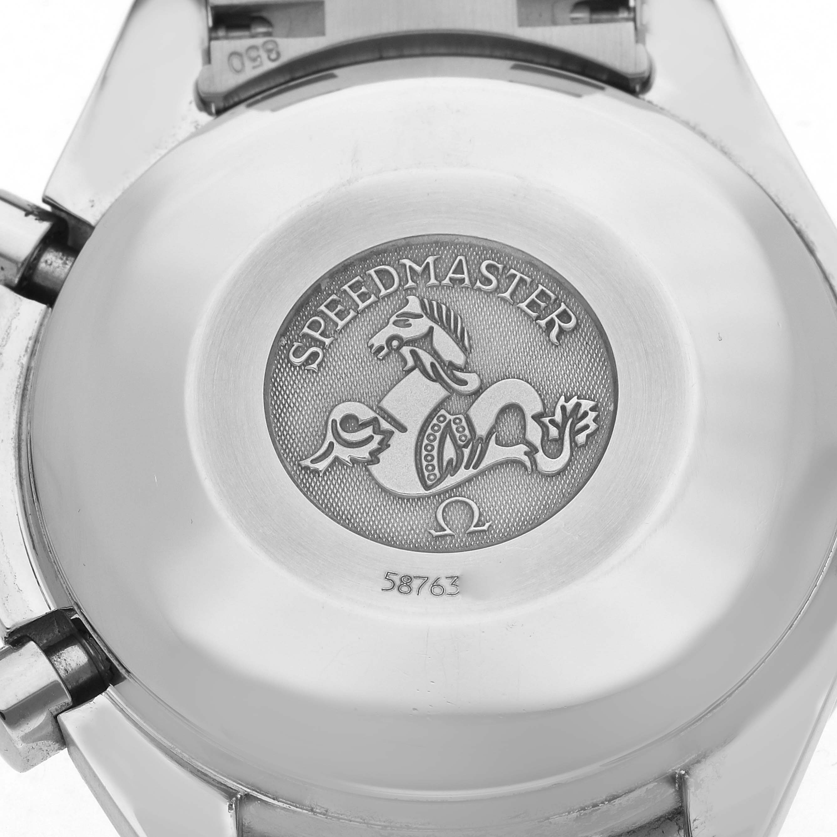 The image shows the back of an Omega Speedmaster 3513.50.00 Men
s Stainless Steel Black Dial 3513.50.00 Men
s Stainless Steel Black Dial watch, featuring the engraved logo and serial number.