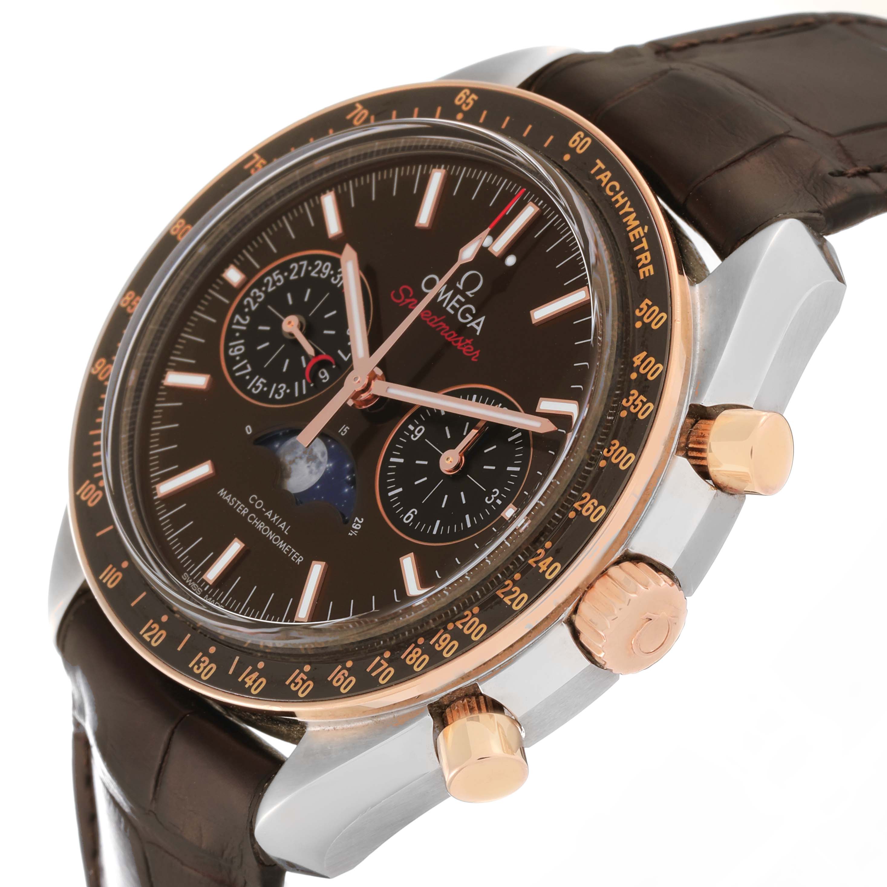 This image shows the Omega Speedmaster 304.23.44.52.13.001 Men's Stainless Steel Brown Dial 304.23.44.52.13.001 Men's Stainless Steel Brown Dial watch at an angle that highlights its dial, sub-dials, bezel, pushers, and crown.