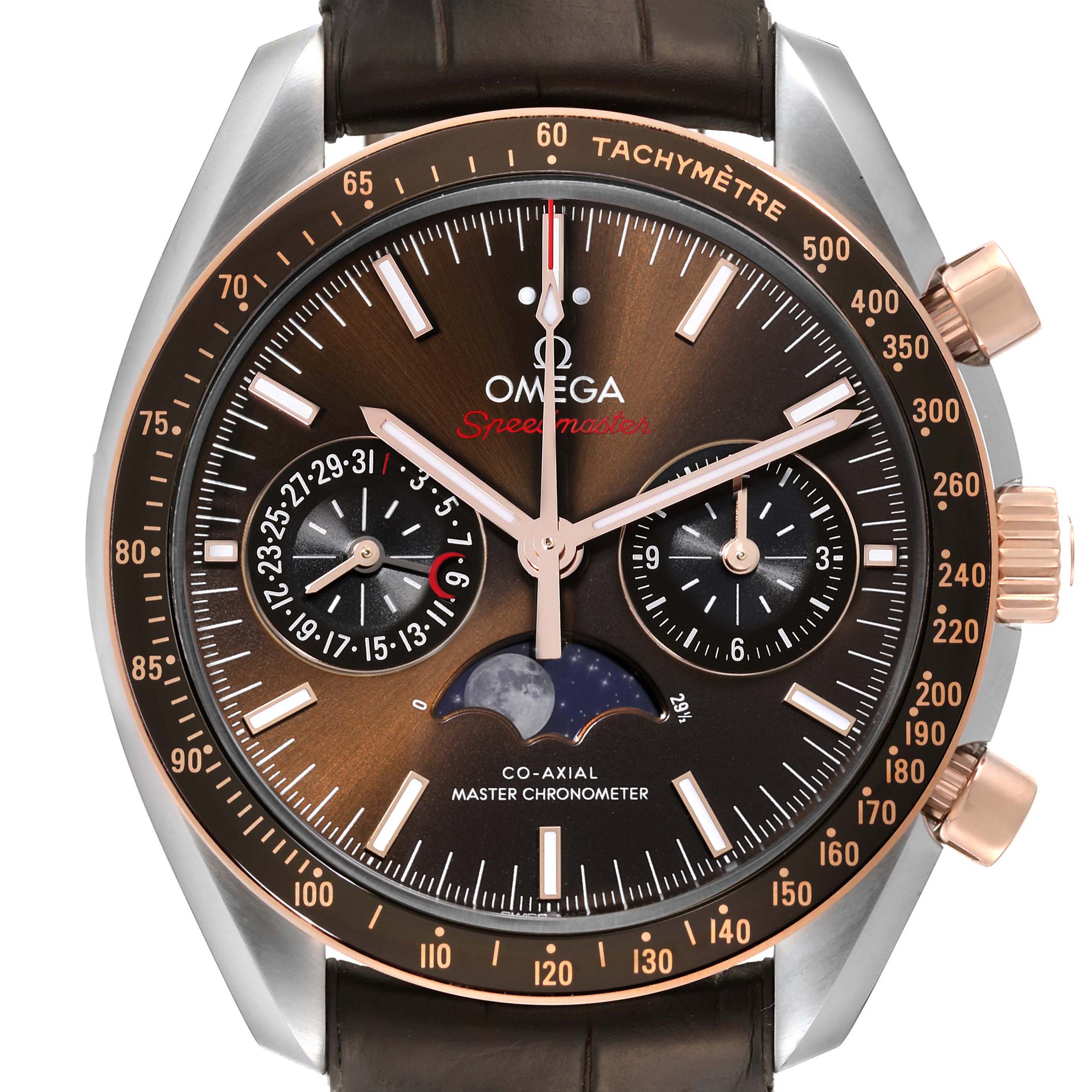 The image shows the dial and bezel of an Omega Speedmaster 304.23.44.52.13.001 Men's Stainless Steel Brown Dial 304.23.44.52.13.001 Men's Stainless Steel Brown Dial watch, featuring a tachymeter scale and various subdials.