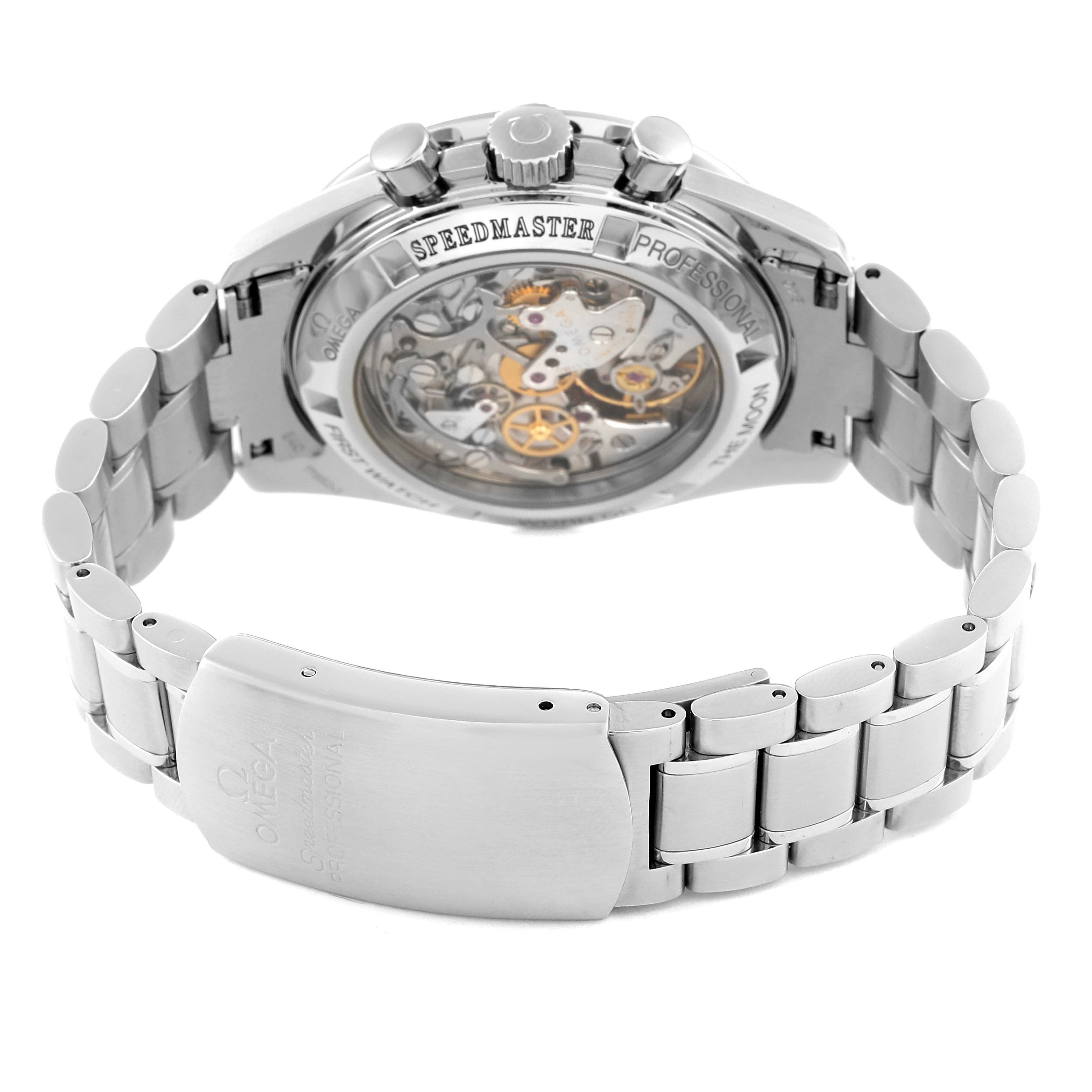 The Omega Speedmaster 3572.50.00 Men
s Stainless Steel Black Dial 3572.50.00 Men
s Stainless Steel Black Dial watch is shown from the back, highlighting the open case back displaying the movement and the metal bracelet.