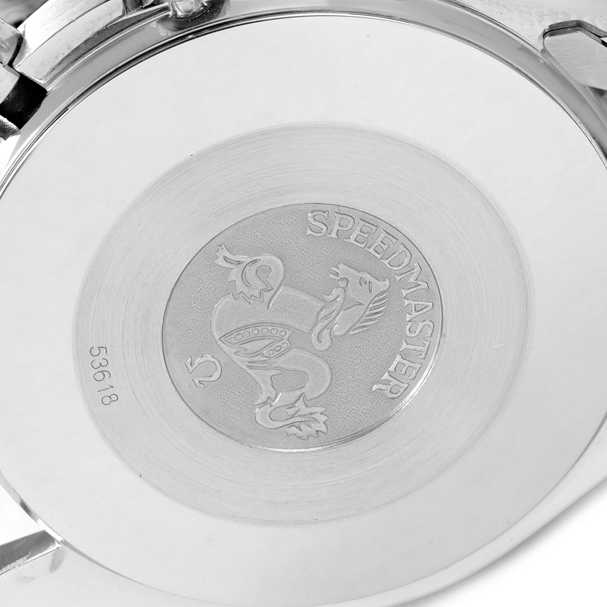 The image shows the case back of the Omega Speedmaster 3510.50.00 Men
s Stainless Steel Black Dial 3510.50.00 Men
s Stainless Steel Black Dial watch, featuring an engraved emblem and model name.