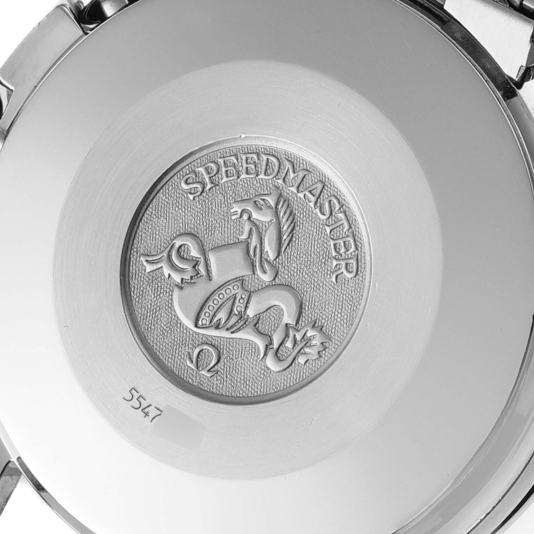 This image shows the backside of an Omega Speedmaster 3510.12.00 Men's Stainless Steel Yellow Dial 3510.12.00 Men's Stainless Steel Yellow Dial watch, featuring the emblem and part of the bracelet.