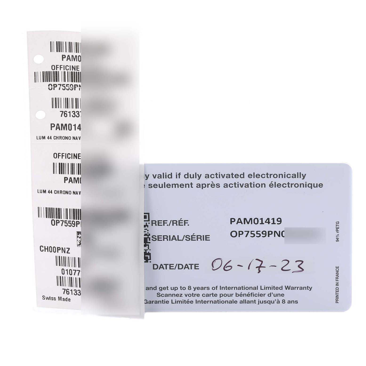 The image shows warranty and barcode cards for the Panerai Luminor PAM01419 Men's Ceramic Black Dial PAM01419 Men's Ceramic Black Dial model, viewed from above.