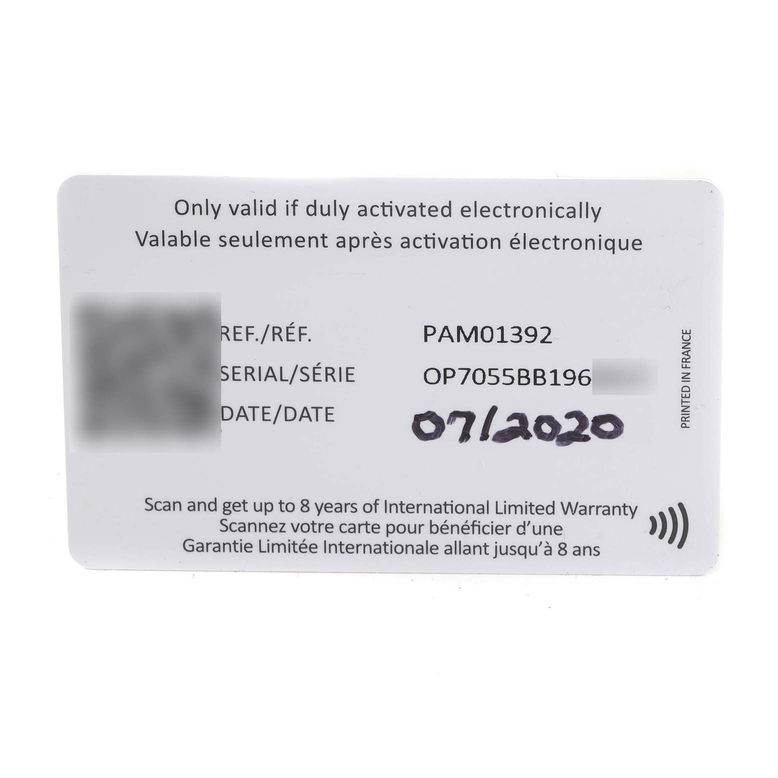 The image shows a warranty card for a Panerai Luminor PAM01392 Men
s Stainless Steel Black Dial PAM01392 Men
s Stainless Steel Black Dial model PAM01392, featuring the reference number, serial number, and date.