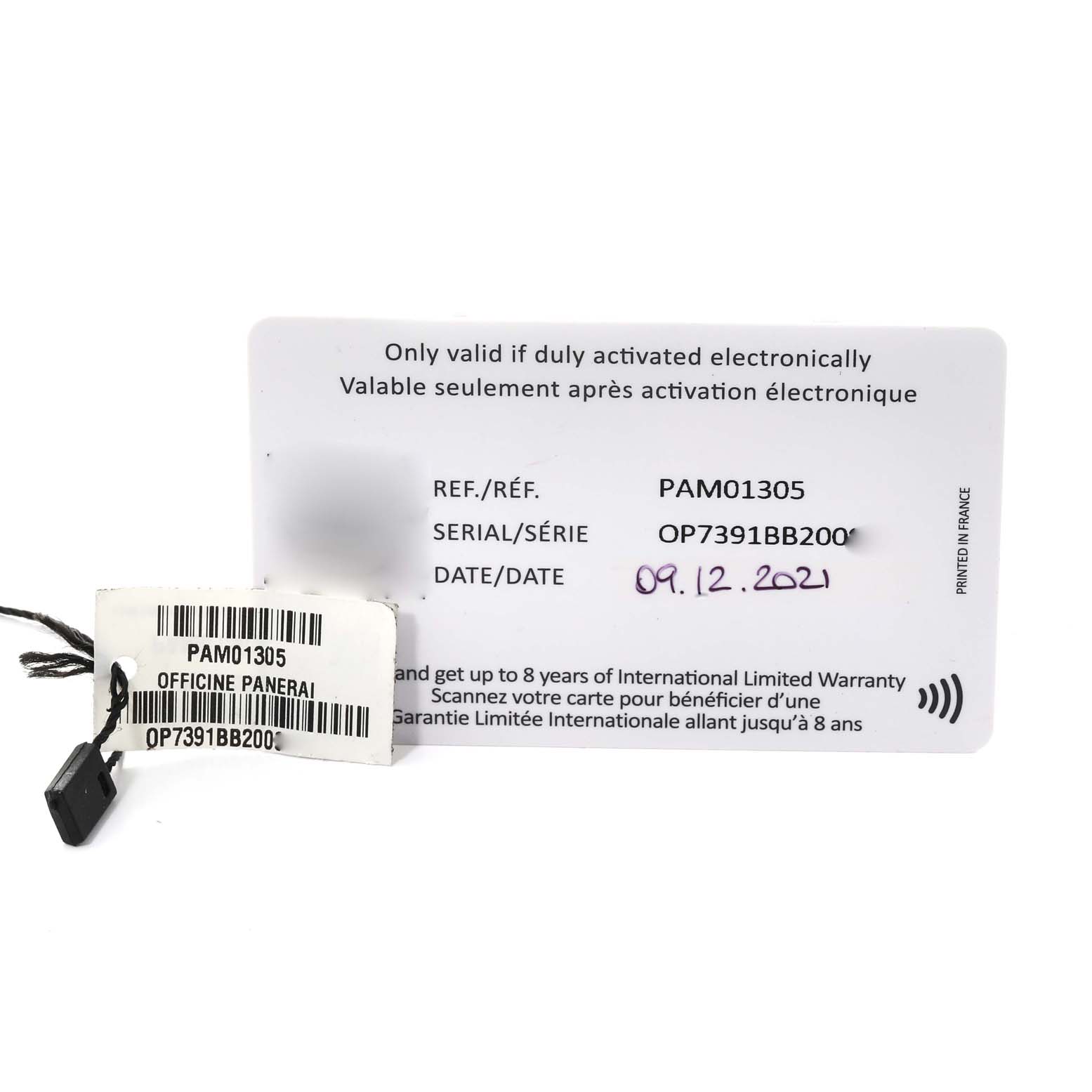 The image shows the warranty card and tag with reference and serial numbers for a Panerai Submersible PAM01305 Men's Titanium Black Dial PAM01305 Men's Titanium Black Dial PAM01305 watch.