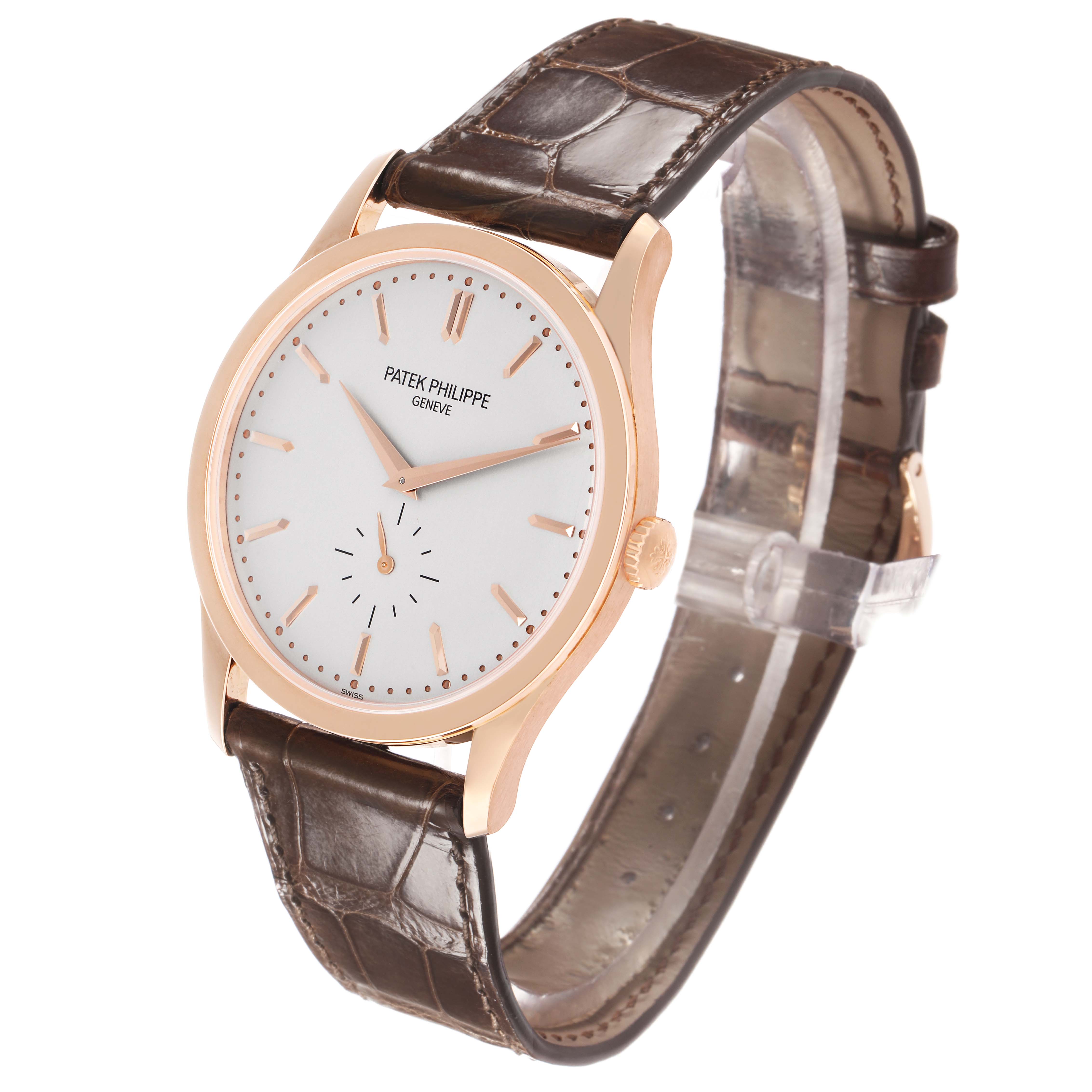 The Patek Philippe Calatrava 5196R Men's Rose Gold Silver Dial watch is shown at a slight side angle, displaying the dial, crown, and leather strap.