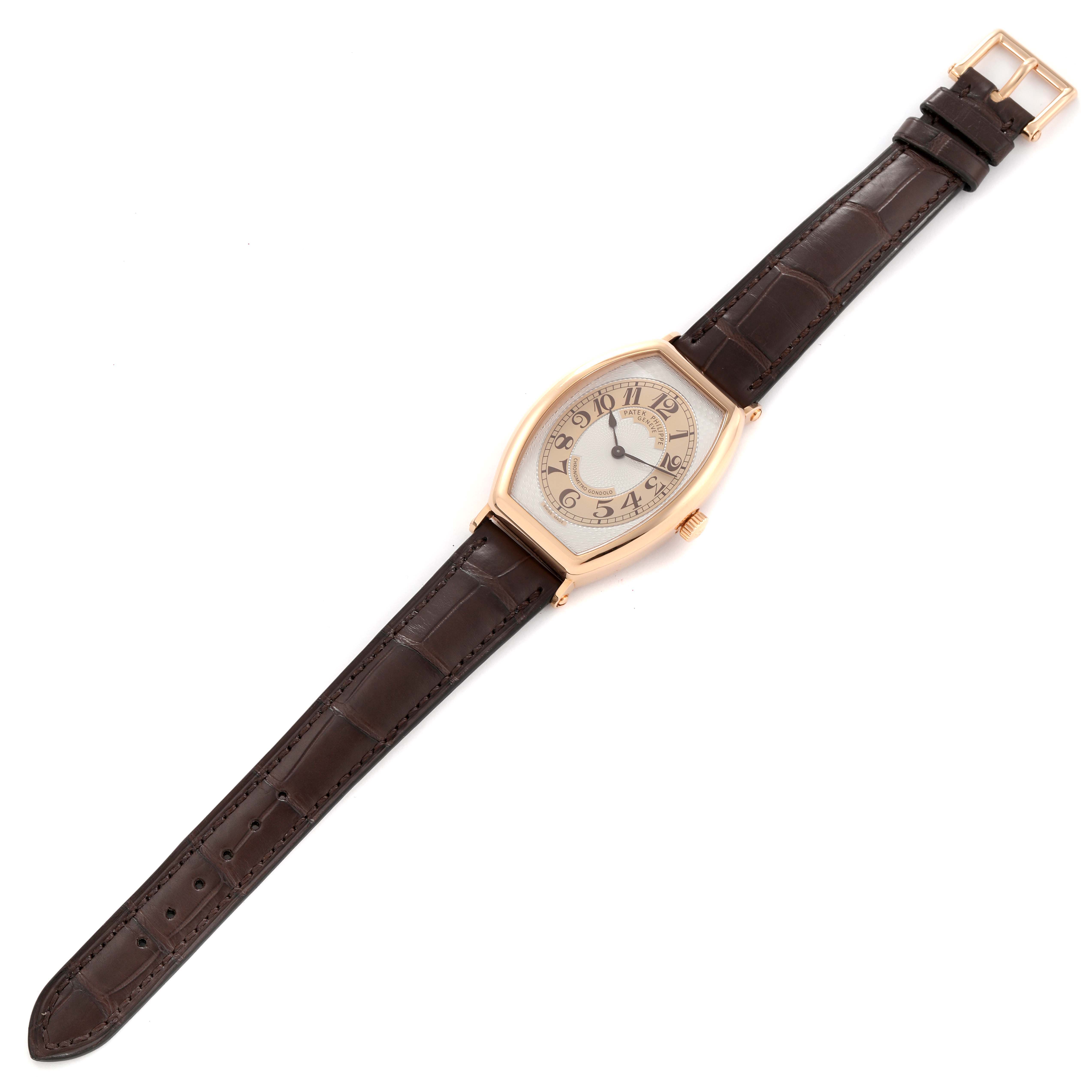 The image shows a full view of the Patek Philippe Gondolo 5098R-001 Men's Rose Gold Silver Dial 5098R-001 Men's Rose Gold Silver Dial watch, displaying the face, hands, leather strap, and buckle from an overhead angle.