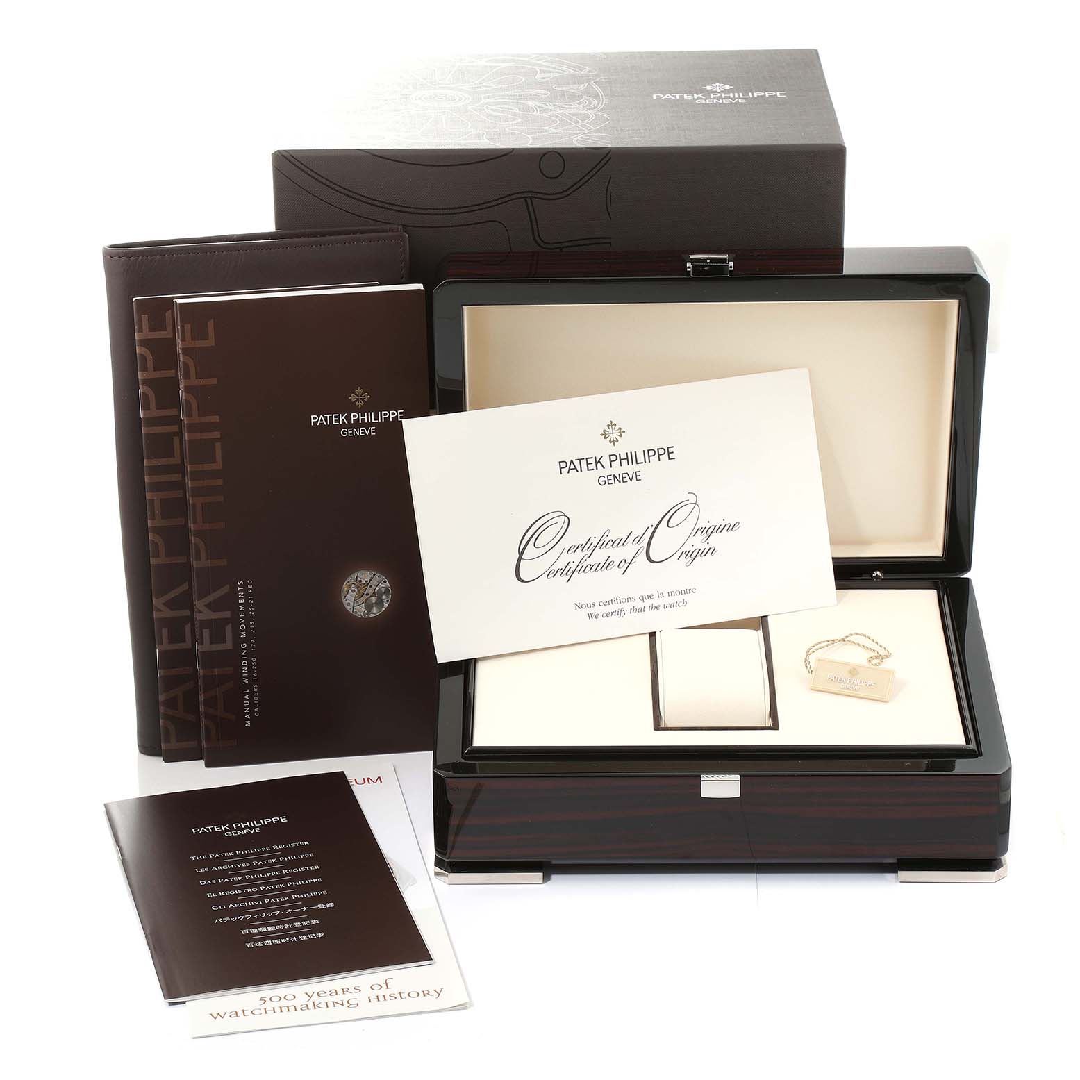 The image shows the packaging, certificate, and documentation for the Patek Philippe Gondolo 5098R-001 Men's Rose Gold Silver Dial 5098R-001 Men's Rose Gold Silver Dial watch, with a focus on the open box and papers.