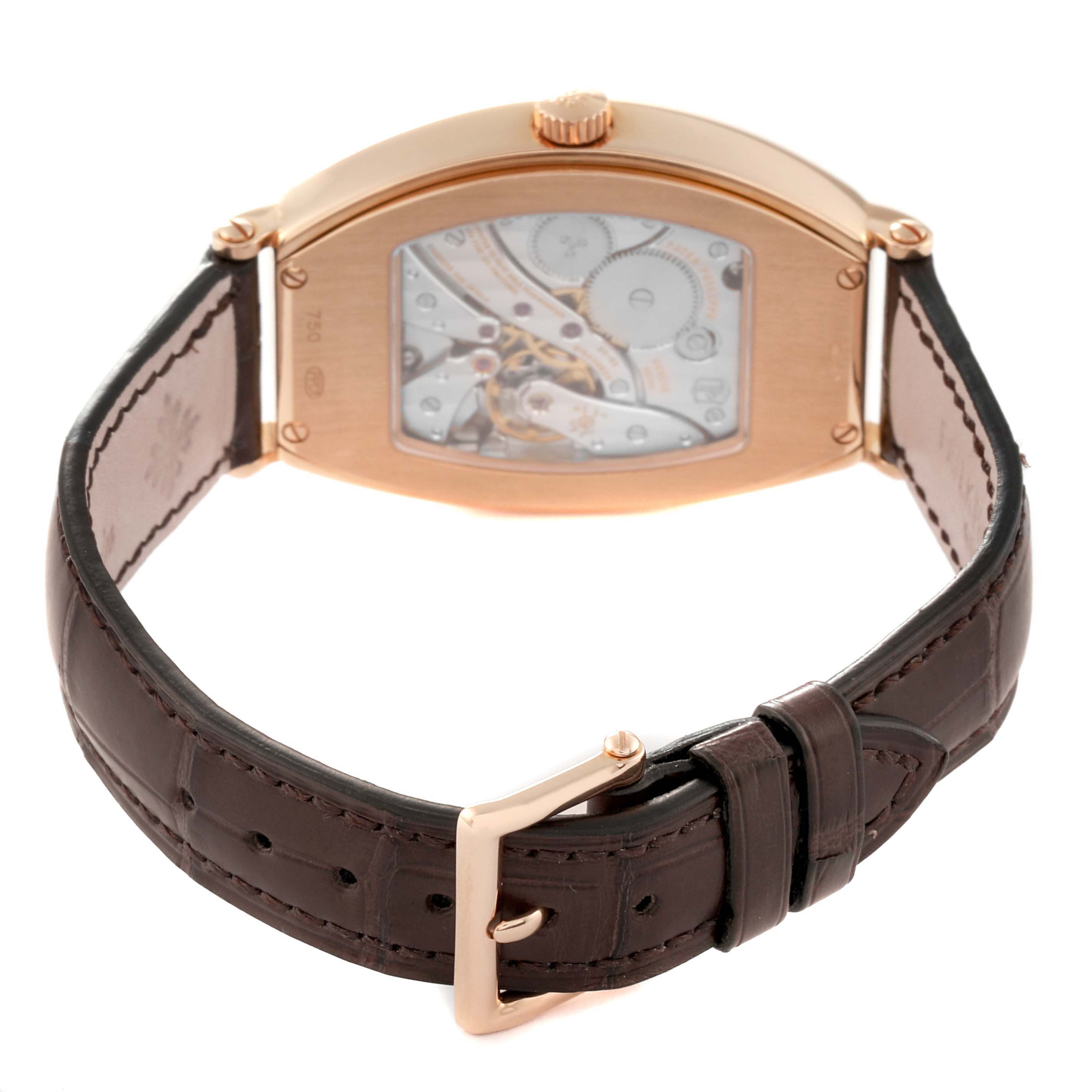 The image shows the back view of the Patek Philippe Gondolo 5098R-001 Men's Rose Gold Silver Dial 5098R-001 Men's Rose Gold Silver Dial watch, highlighting the leather strap and transparent case back.