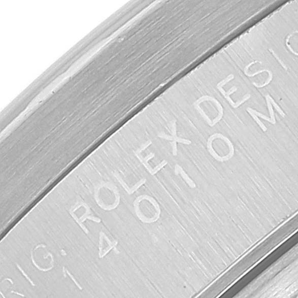 This close-up image shows the engraved inner bezel of a Rolex Air-King 14010 Men's Stainless Steel Blue Dial 14010 Men's Stainless Steel Blue Dial watch, featuring the Rolex branding and model number.