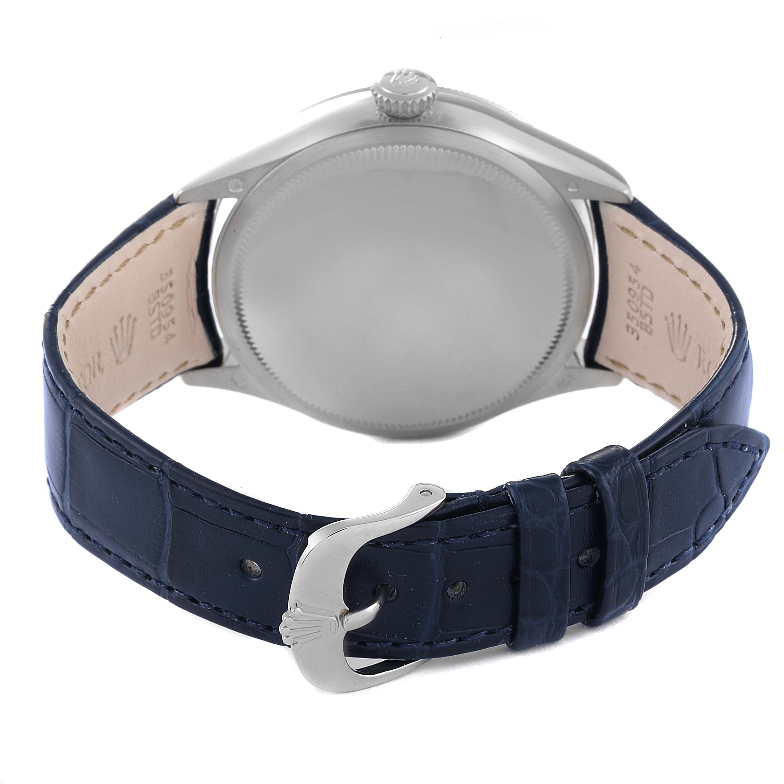The image shows the back case and strap of a Rolex Cellini 50519 Men
s White Gold Blue Dial 50519 Men
s White Gold Blue Dial watch, with the watch positioned upside down.