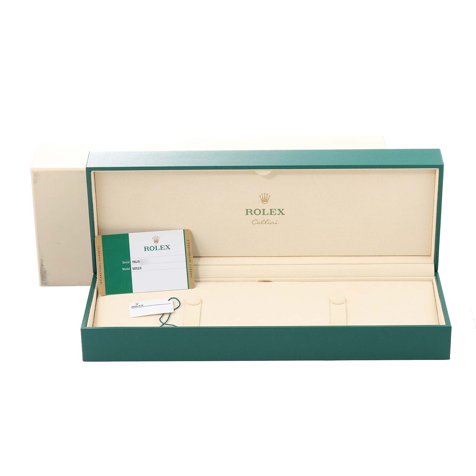 This image shows the open green and beige box, warranty card, and tag for a Rolex Cellini 50519 Men
s White Gold Blue Dial 50519 Men
s White Gold Blue Dial model watch.