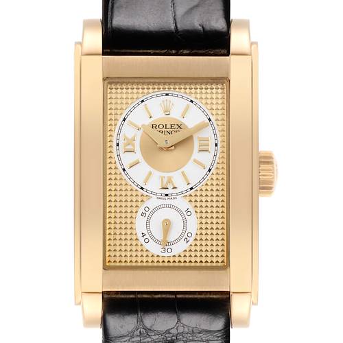 The Rolex Cellini watch is shown from the front, highlighting its rectangular dial, gold case, and black leather strap.