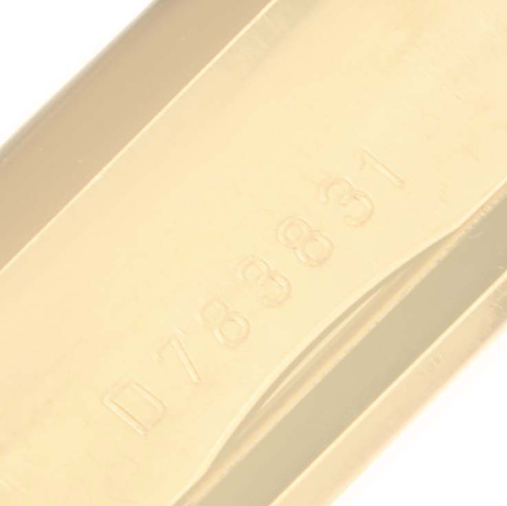 This image shows the serial number engraving on the gold band of a Rolex Cellini 5440/8 Men
s Yellow Gold Champagne Dial 5440/8 Men
s Yellow Gold Champagne Dial watch.