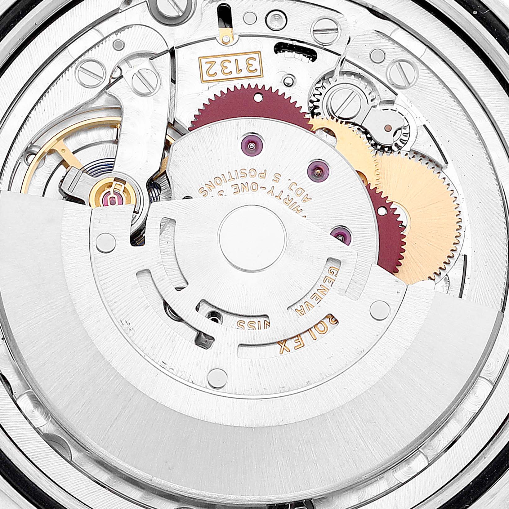 The image shows the intricate internal mechanism of a Rolex Cellini 50509 Men's White Gold White Dial 50509 Men's White Gold White Dial model watch, including gears and rotating components.