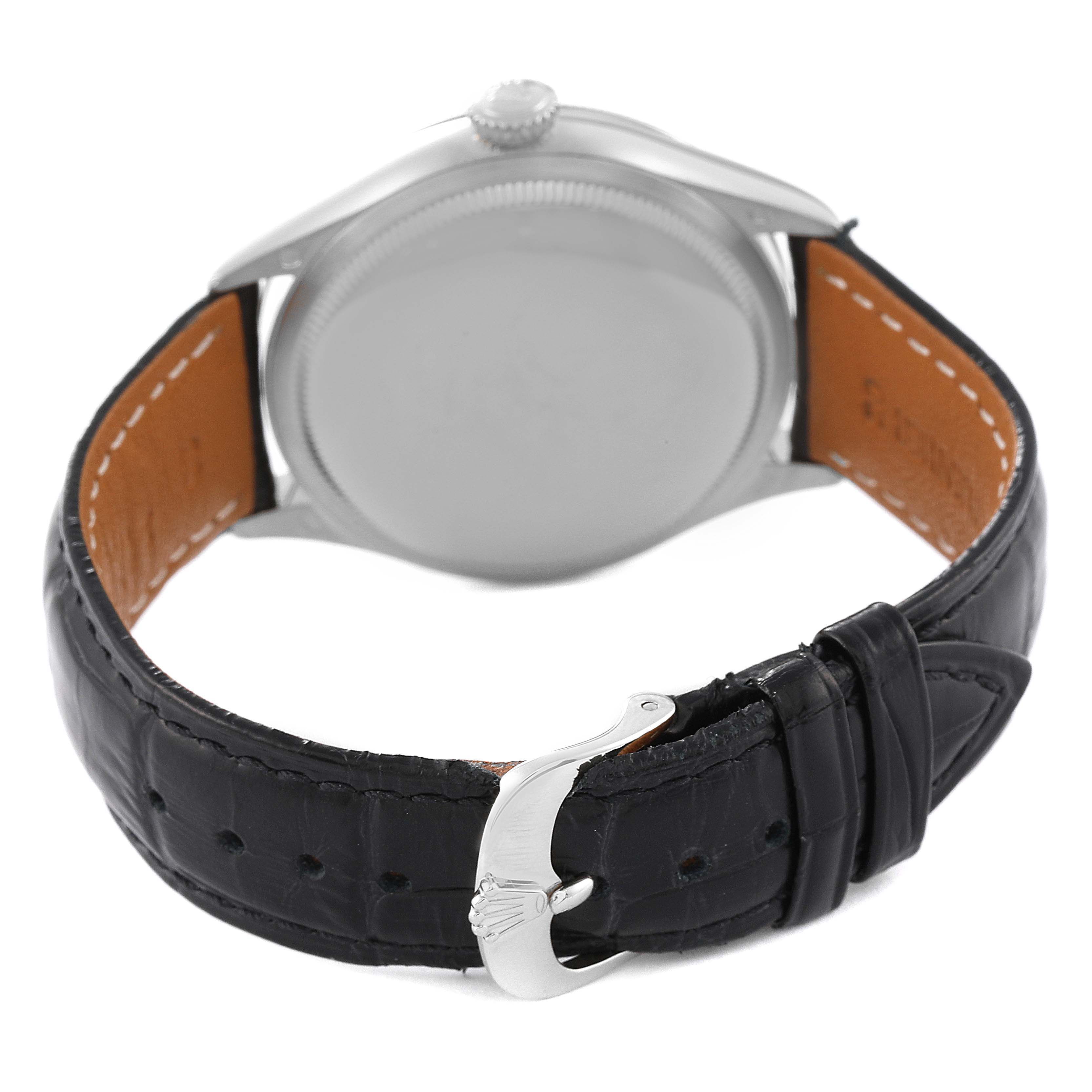 This image displays the back view of a Rolex Cellini 50509 Men's White Gold White Dial 50509 Men's White Gold White Dial watch, highlighting its case back and leather strap with a buckle.