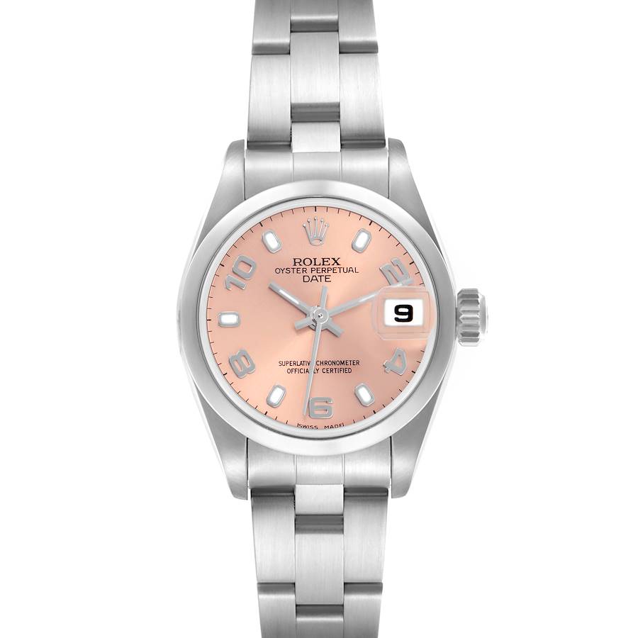 The Rolex Date model is shown from a top-down angle, displaying the pink dial, hands, date window, and bracelet.