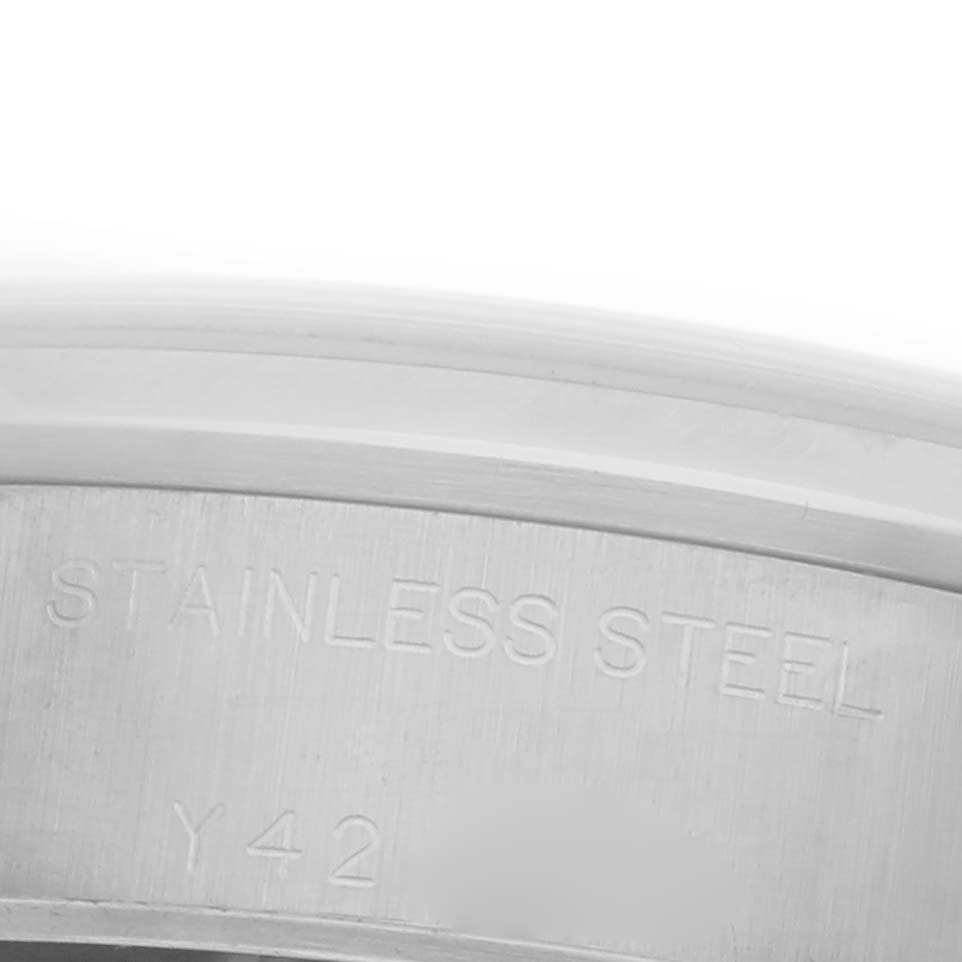 The image shows a close-up of the stainless steel casing back, focusing on the text for the Rolex Date 79160 Women's Stainless Steel Pink Dial 79160 Women's Stainless Steel Pink Dial model.