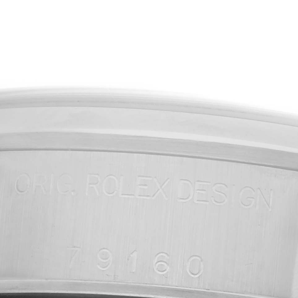 The image shows the inner engraving on the casing of a Rolex Date 79160 Women's Stainless Steel Pink Dial 79160 Women's Stainless Steel Pink Dial model, featuring the serial number "79160."