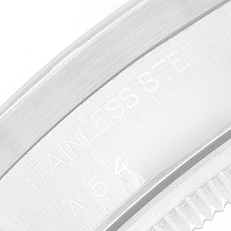 This image shows a close-up of the case side and part of the bezel of the Rolex Date 15210 Men's Stainless Steel Black Dial 15210 Men's Stainless Steel Black Dial, highlighting the "STAINLESS STEEL" engraving.