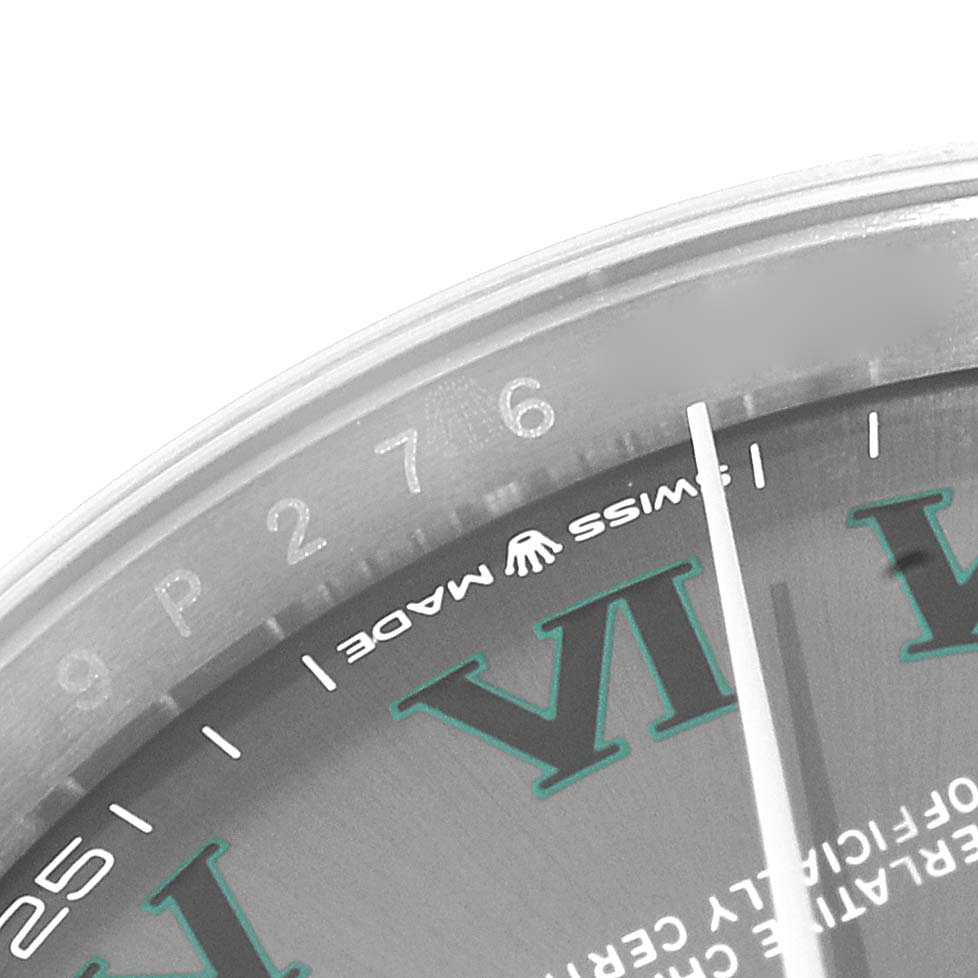 The partial face of the Rolex Datejust 126200 Men's Stainless Steel Grey Dial 126200 Men's Stainless Steel Grey Dial watch is shown, highlighting the "Swiss Made" text and Roman numerals.