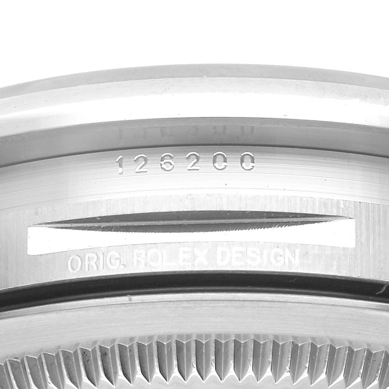 This image shows a close-up of the case back edge of a Rolex Datejust 126200 Men's Stainless Steel Grey Dial 126200 Men's Stainless Steel Grey Dial, displaying model number 126200.
