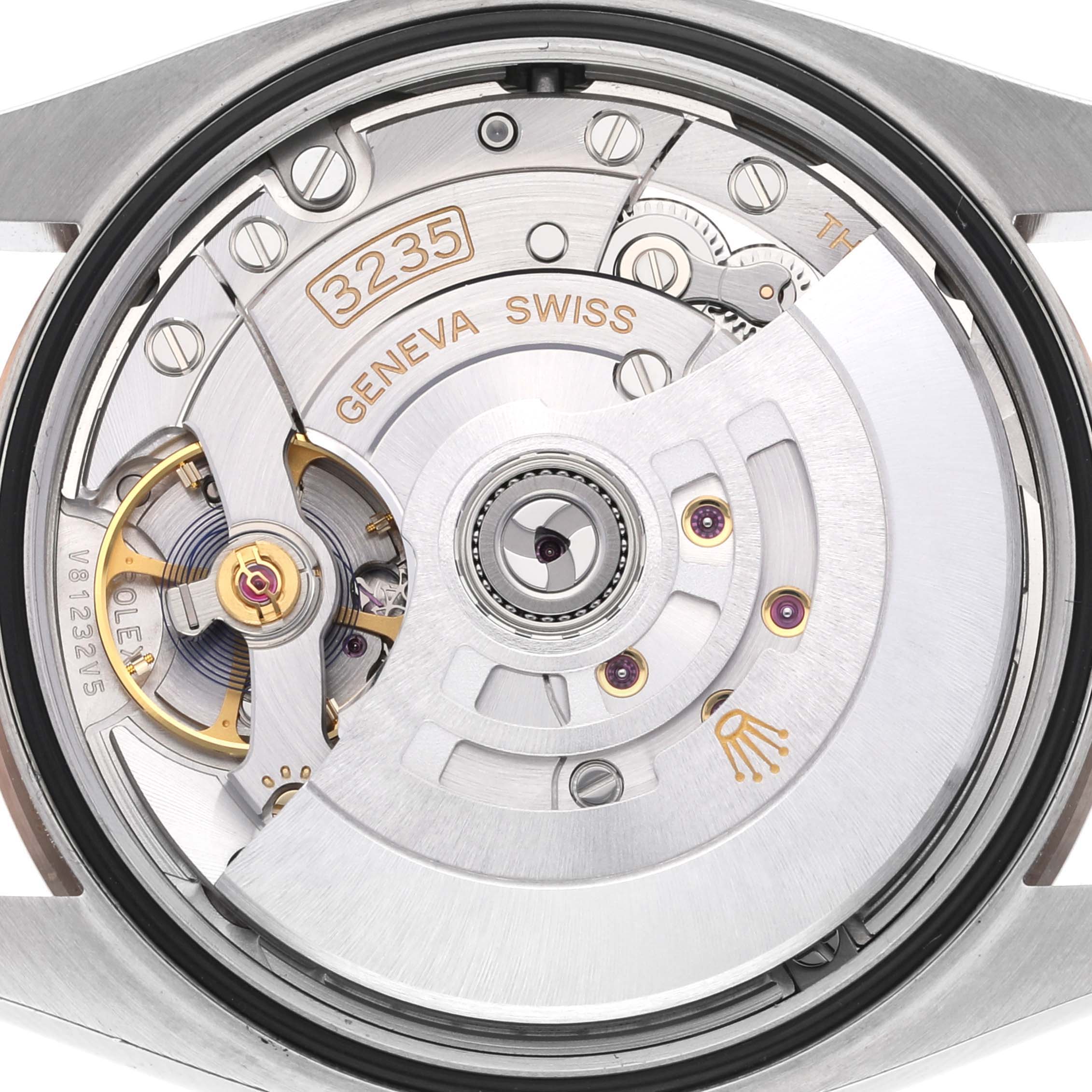 This image shows a close-up view of the movement and internal mechanism of a Rolex Datejust 126201 Men's Steel and Gold (two tone) Grey Dial 126201 Men's Steel and Gold (two tone) Grey Dial watch.