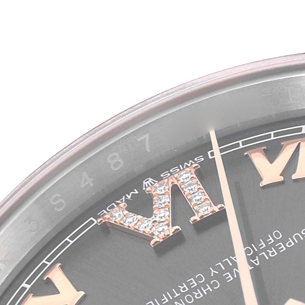 The image shows a close-up view of the dial and markers of a Rolex Datejust 126201 Men's Steel and Gold (two tone) Grey Dial 126201 Men's Steel and Gold (two tone) Grey Dial watch.