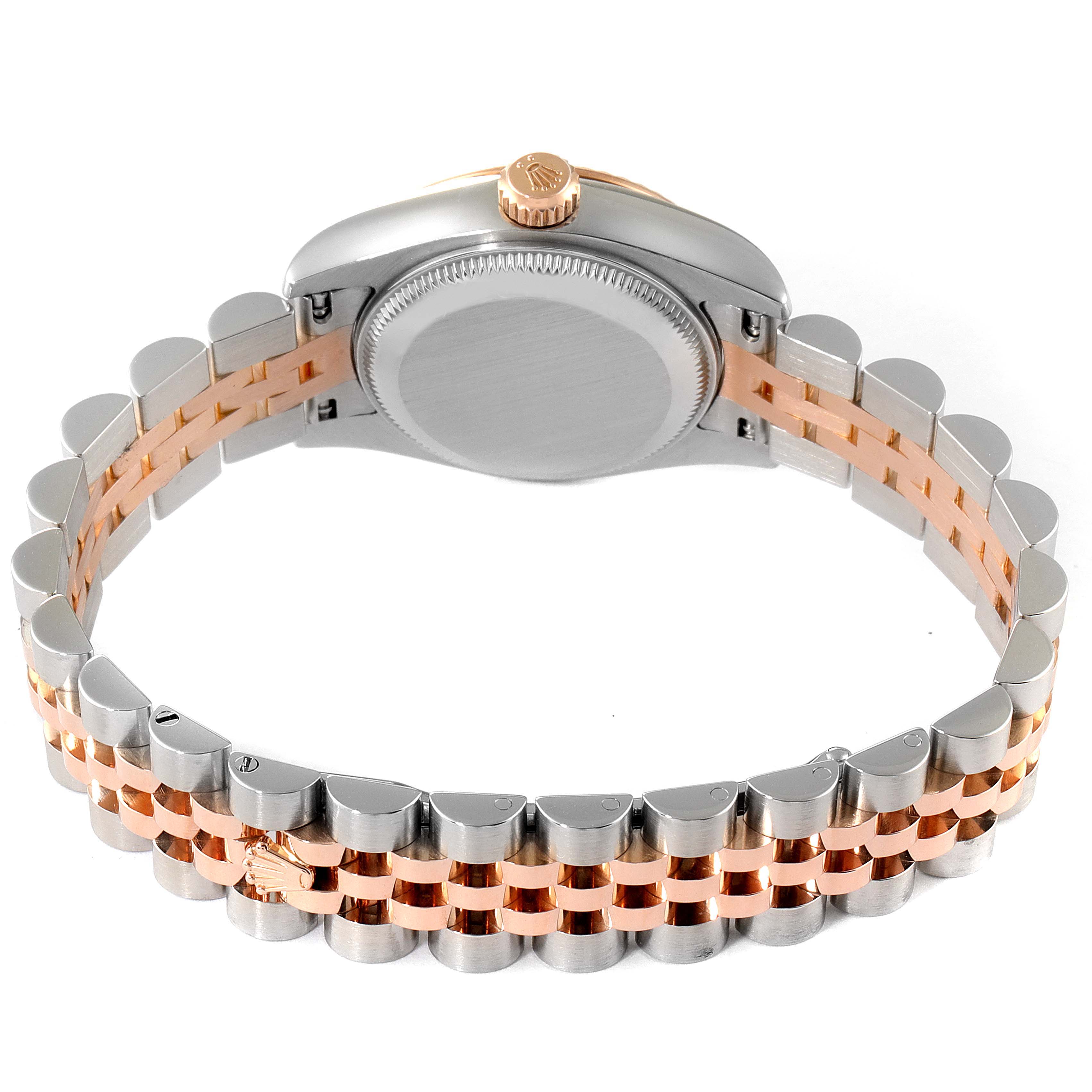 This image shows the back and bracelet of a Rolex Datejust 179171 Women's Steel and Gold (two tone) Pink Dial 179171 Women's Steel and Gold (two tone) Pink Dial model, viewed from an angle showcasing the case back and crown.