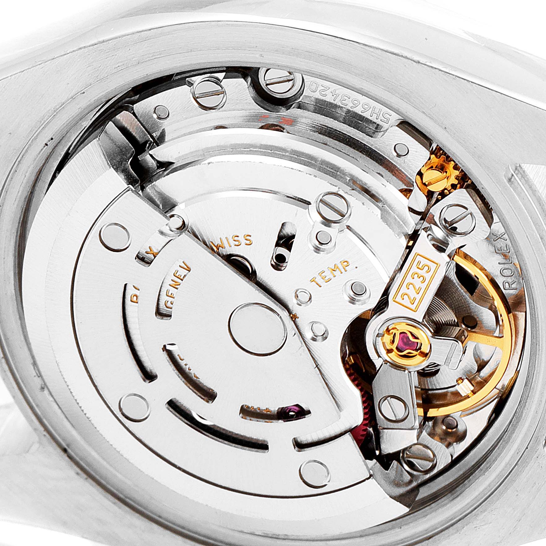 The image shows the inner mechanical movement and parts of a Rolex Datejust 179171 Women's Steel and Gold (two tone) Pink Dial 179171 Women's Steel and Gold (two tone) Pink Dial watch from a close-up angle.