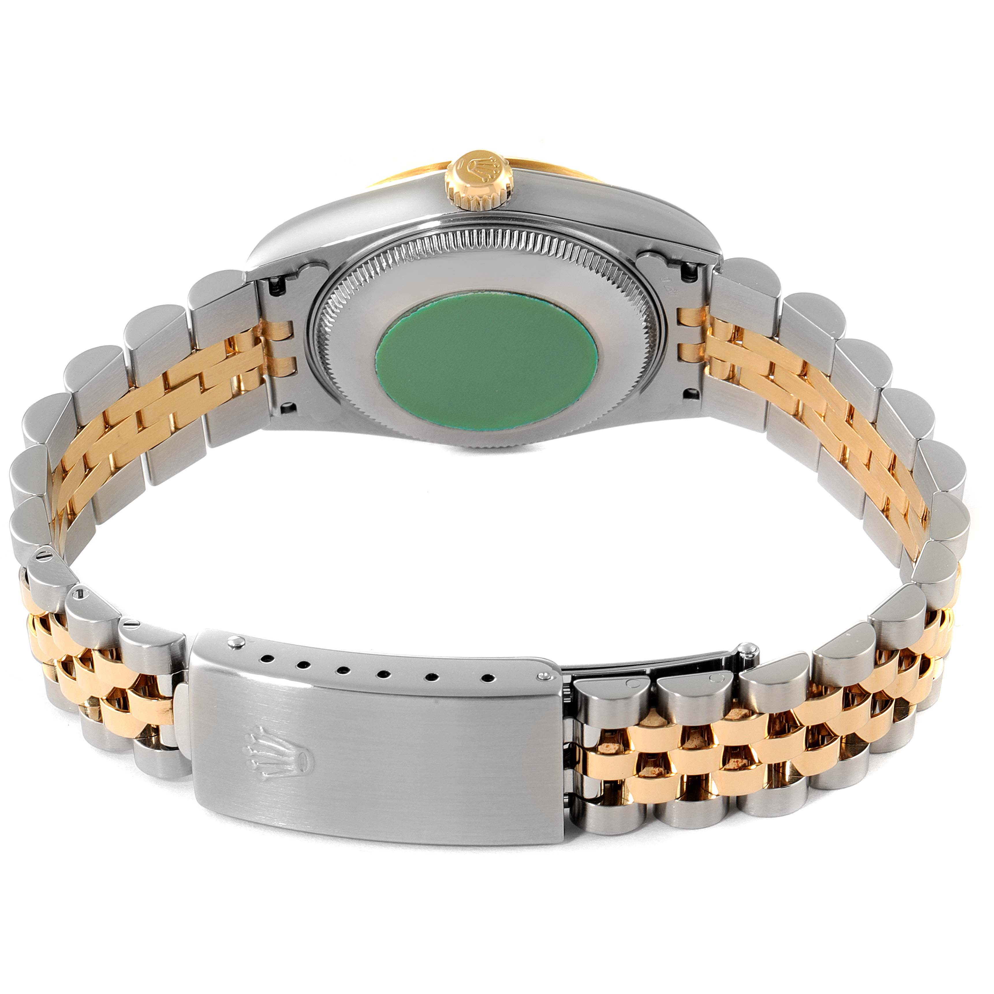 The image shows the backside and clasp of a Mid-Size Rolex watch with a two-tone metal bracelet.