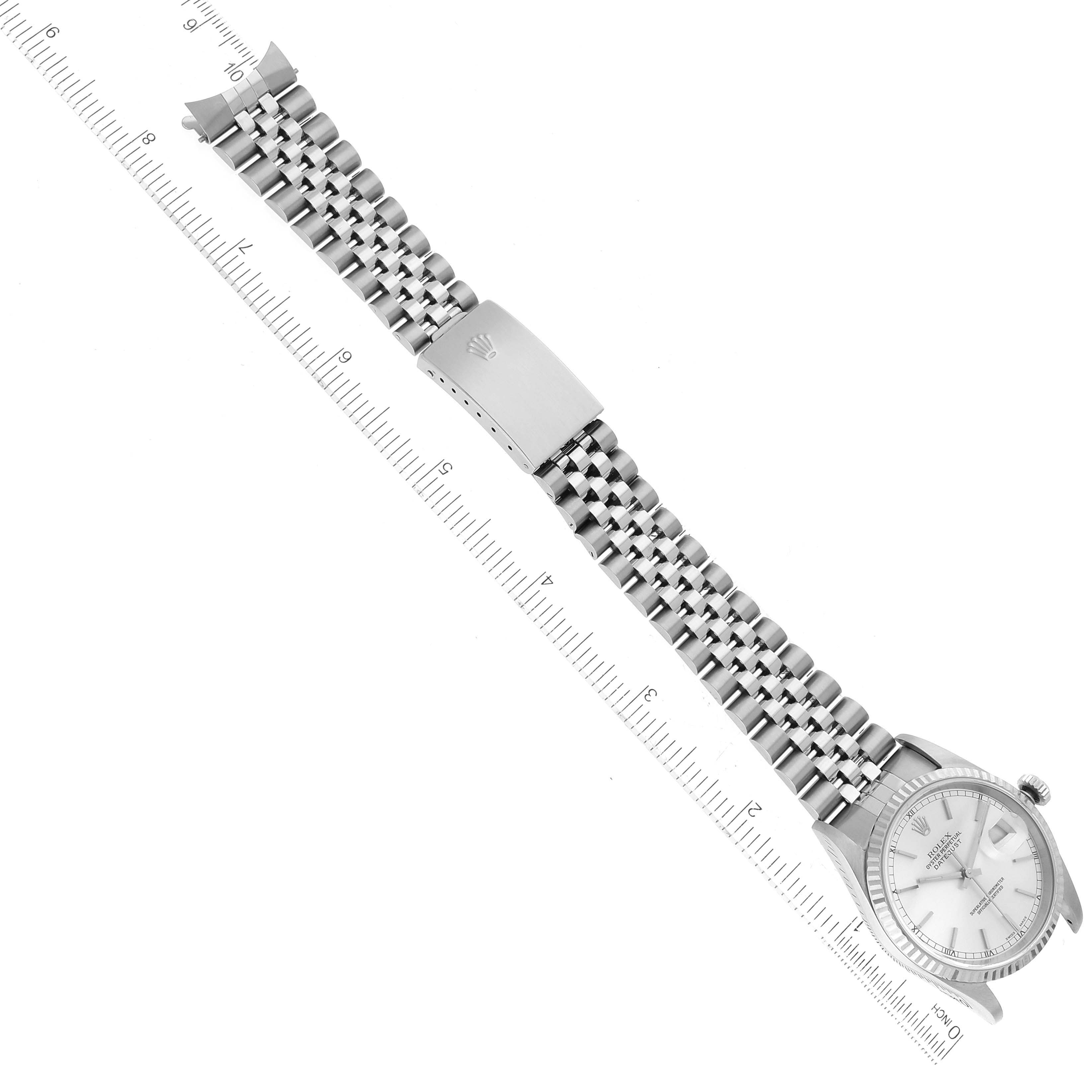 The image shows a Rolex Datejust 16234 Men's Stainless Steel Silver Dial 16234 Men's Stainless Steel Silver Dial watch laid flat, displaying the face, bracelet, and clasp from a top-down angle.