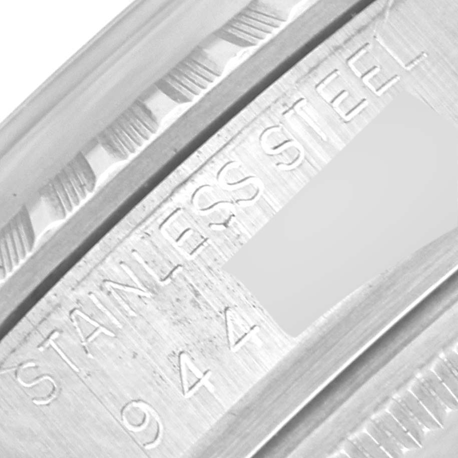 The image shows a partial close-up view of the stainless steel case of the Rolex Vintage Collection 16030 Men's Stainless Steel Silver Dial 16030 Men's Stainless Steel Silver Dial model.