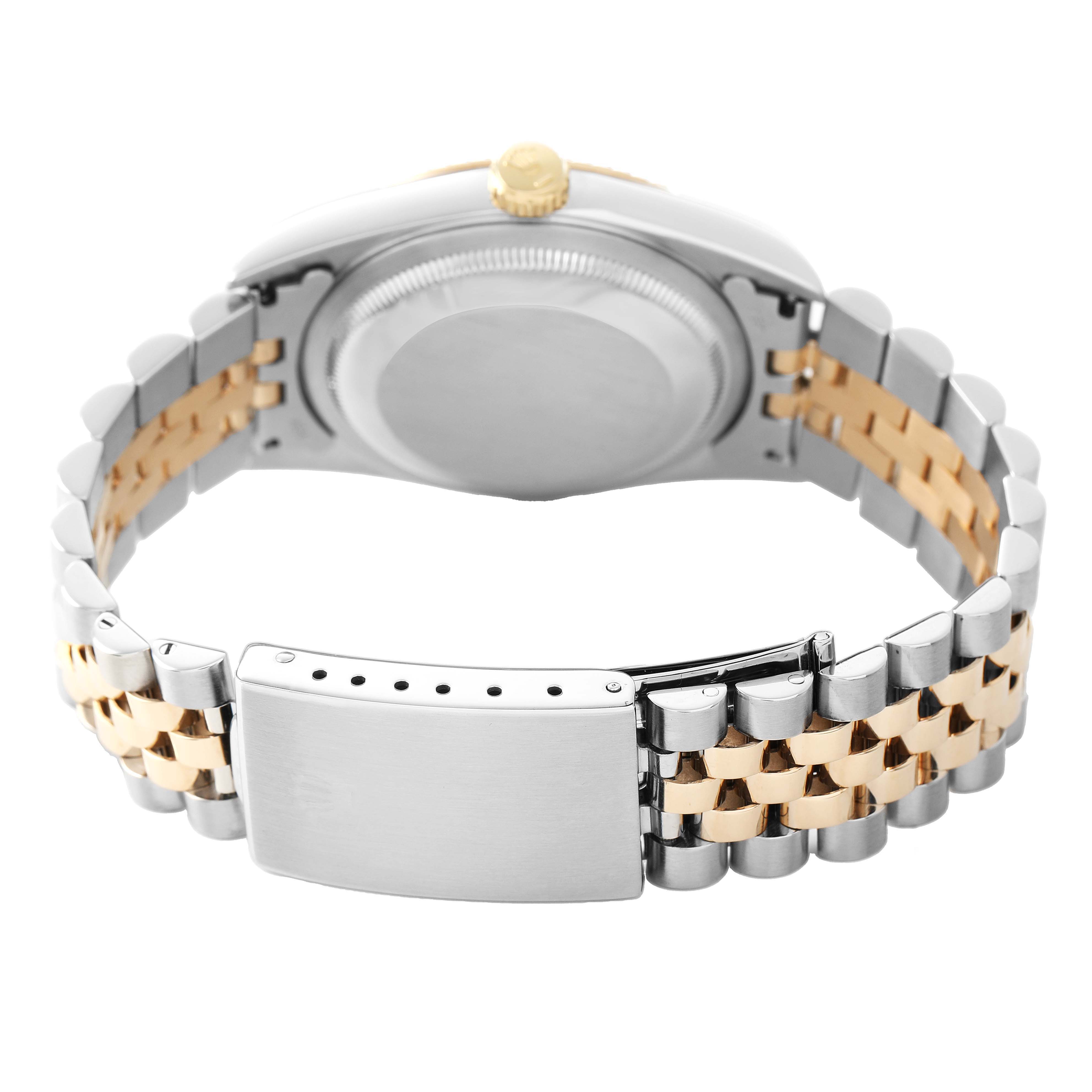 The image shows the back view of a Rolex Datejust 16233 Men's Steel and Gold (two tone) Champagne Dial watch focusing on the clasp and two-tone bracelet.