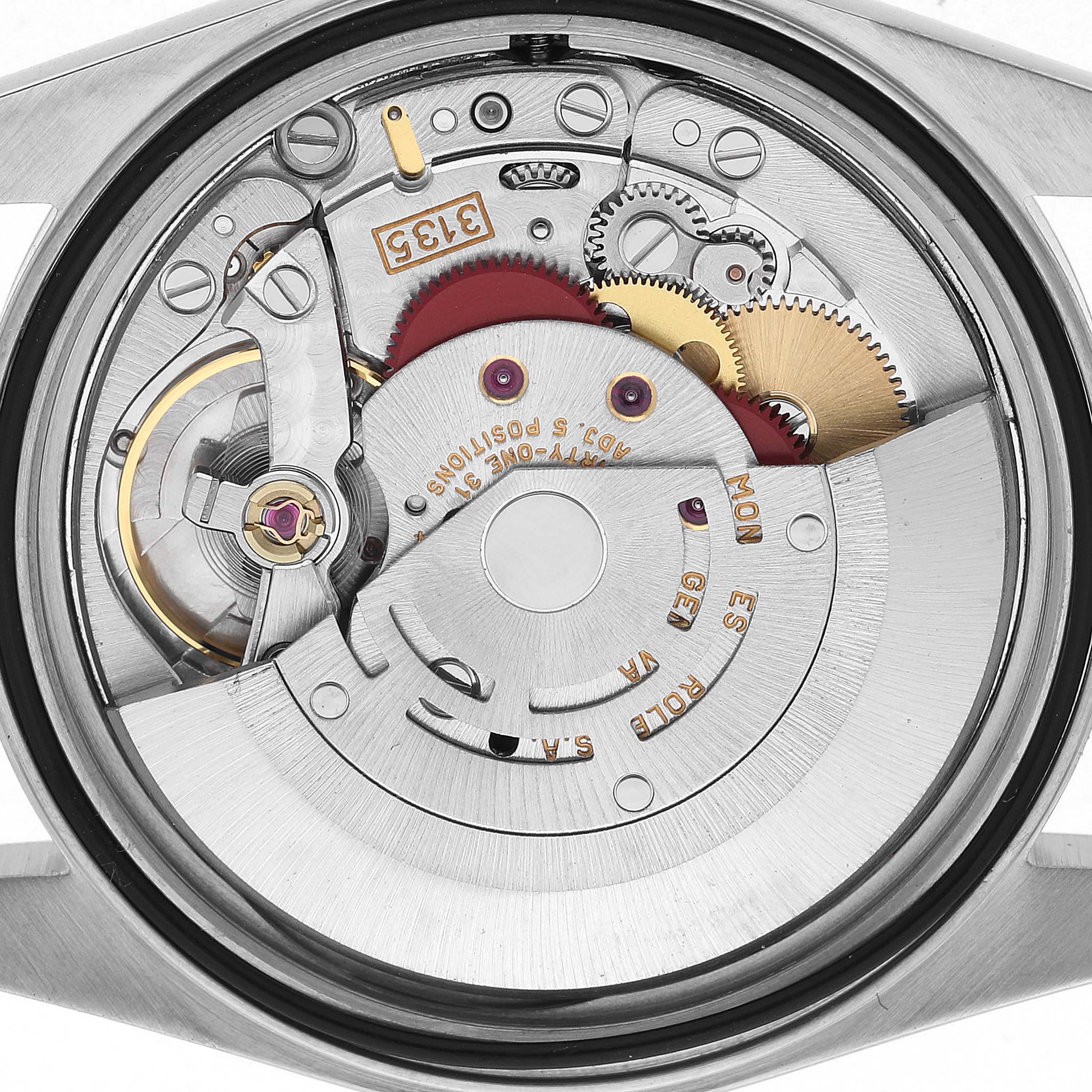 The image shows the movement of a Rolex Datejust 16233 Men's Steel and Gold (two tone) Champagne Dial watch from the back, revealing gears and internal mechanisms.