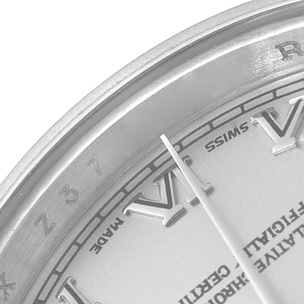 This close-up image shows a portion of the dial, roman numerals, and the minute hand of a Rolex Datejust 179174 Women's Stainless Steel Silver Dial 179174 Women's Stainless Steel Silver Dial watch.
