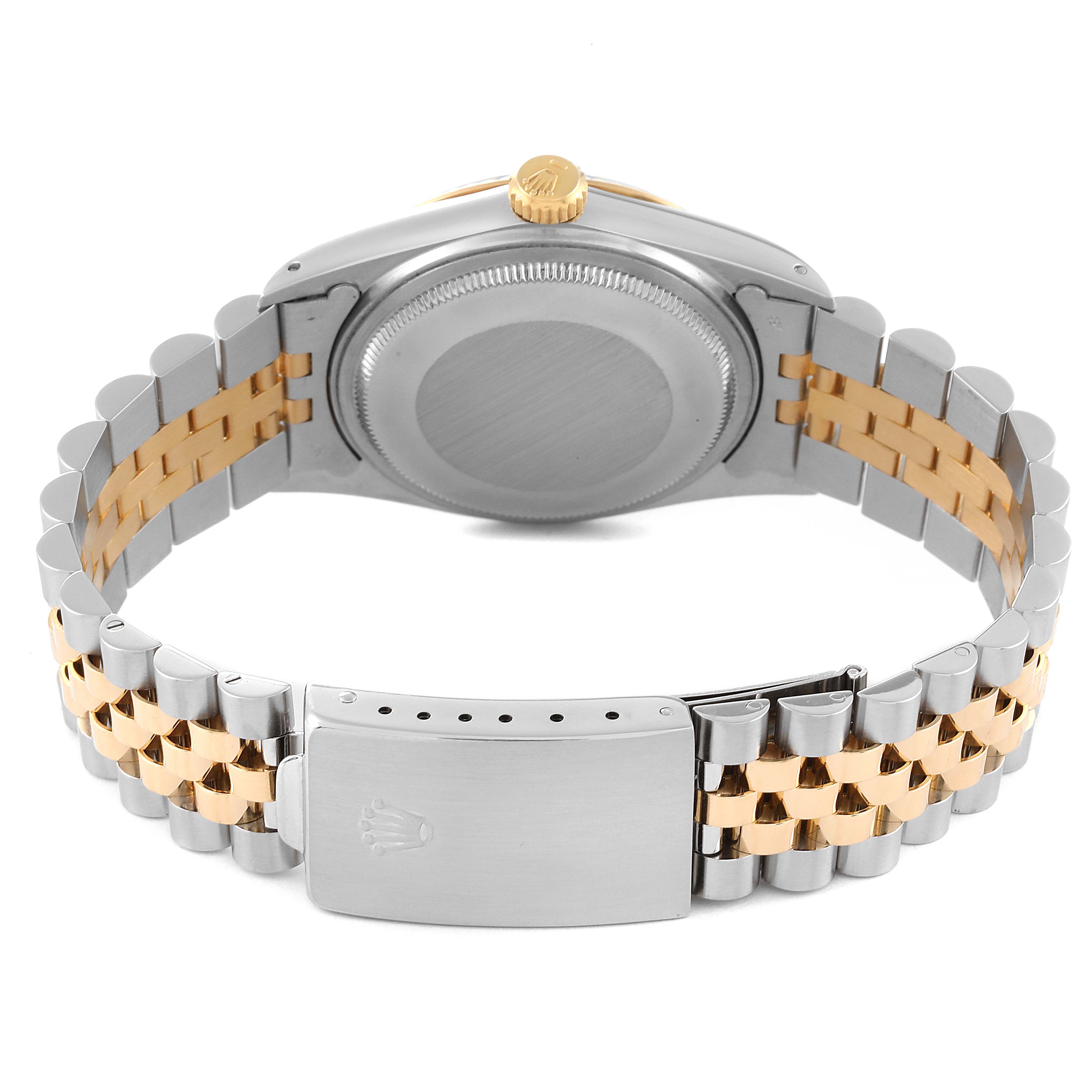 This image shows the back of the Rolex Vintage Collection 16013 Men's Steel and Gold (two tone) White Dial 16013 Men's Steel and Gold (two tone) White Dial watch, including the case back, crown, and metal bracelet with a clasp.