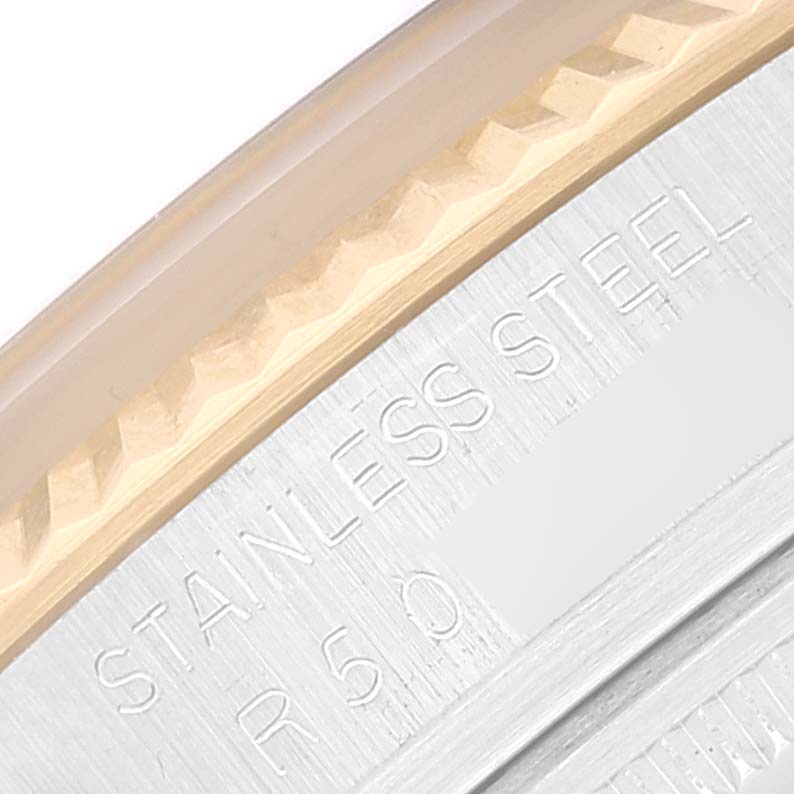 This image shows a close-up of the side of a Rolex Vintage Collection 16013 Men's Steel and Gold (two tone) White Dial 16013 Men's Steel and Gold (two tone) White Dial watch, highlighting the stainless steel and the model engraving.