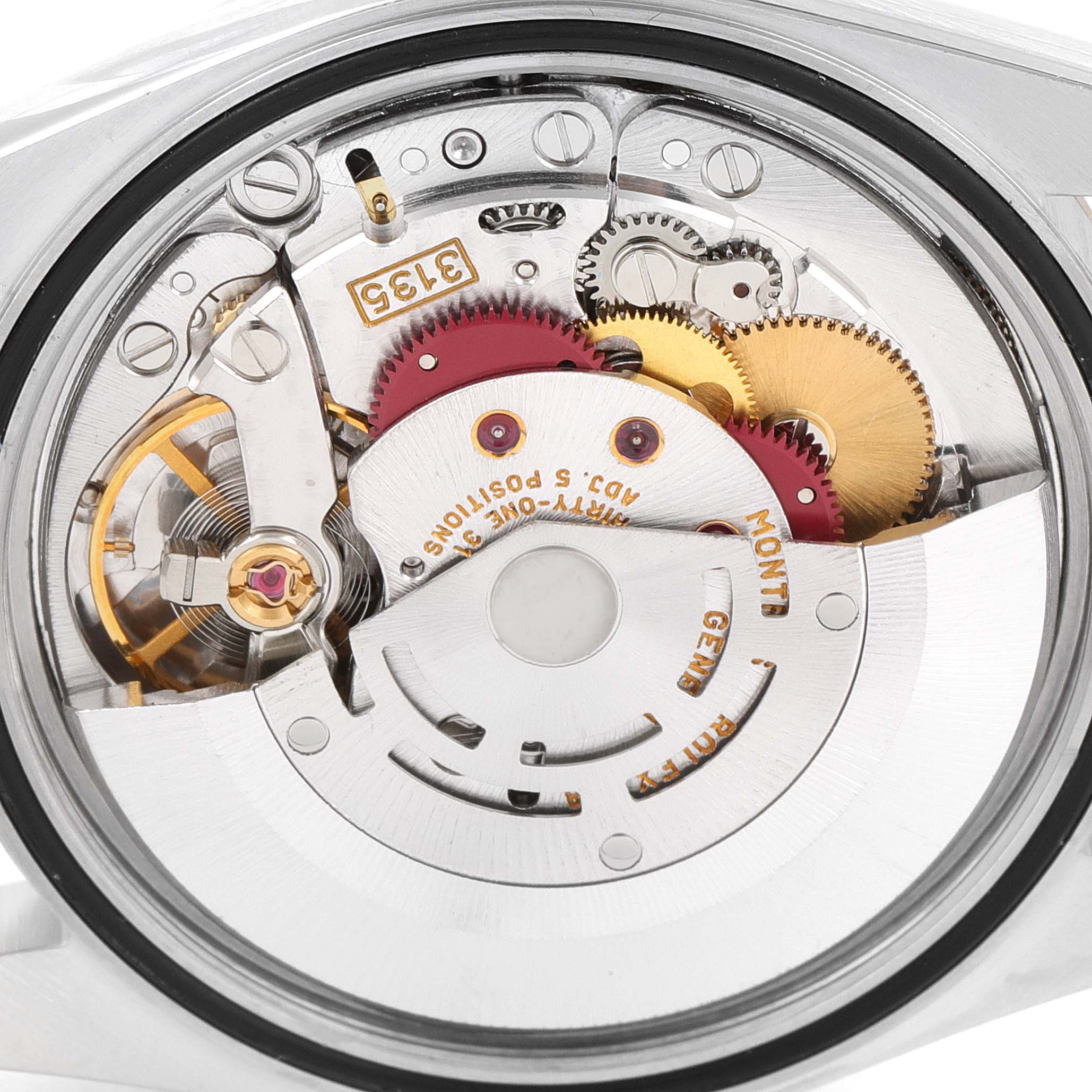 The image shows a close-up of the internal mechanism and movement of a Rolex Datejust 16233 Men's Steel and Gold (two tone) Champagne Dial 16233 Men's Steel and Gold (two tone) Champagne Dial watch from the back.