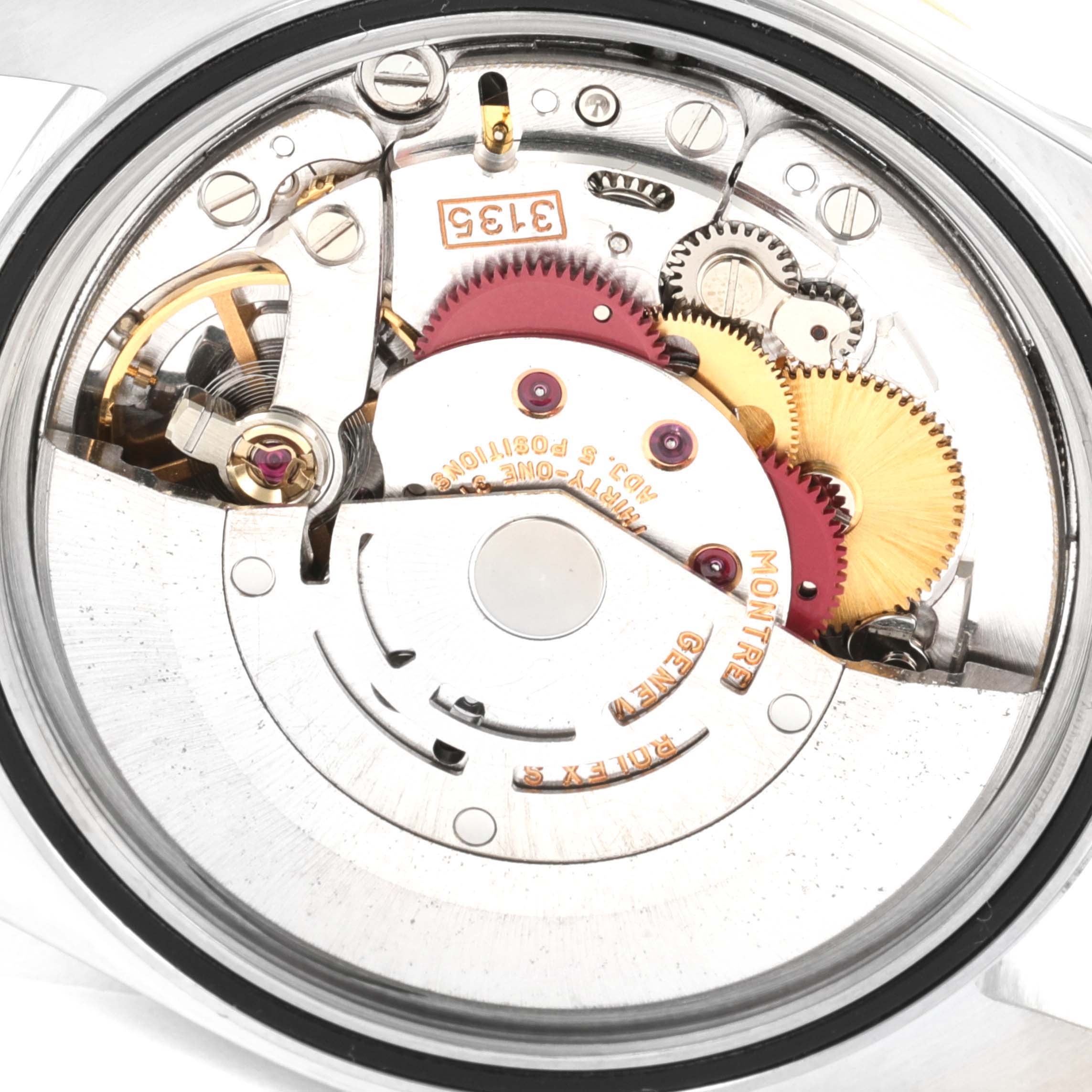 This image shows the movement mechanism of a Rolex Datejust 16233 Men's Steel and Gold (two tone) Beige Dial 16233 Men's Steel and Gold (two tone) Beige Dial watch viewed from the back.